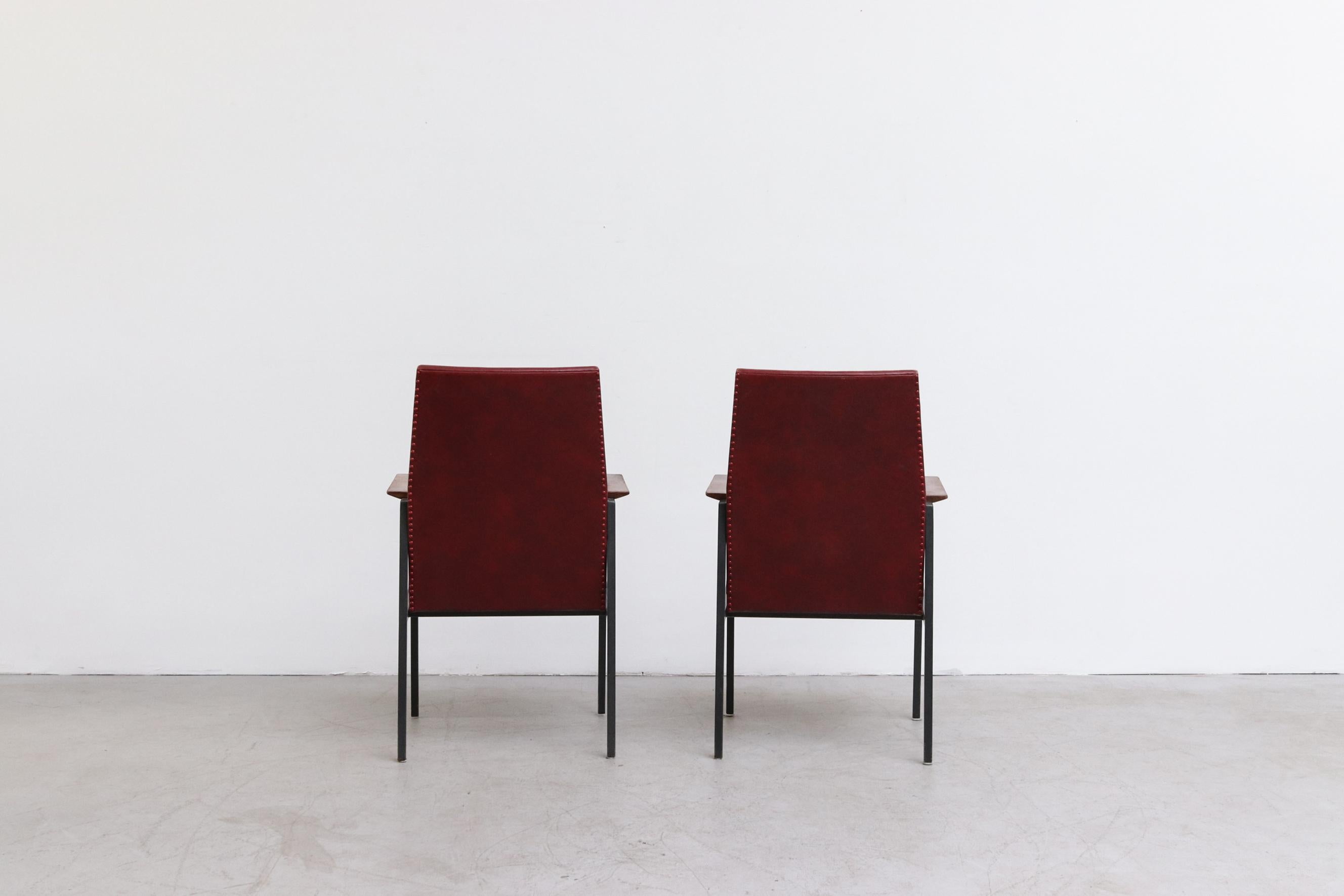 Mid-20th Century Original Tijsselling Arm Chairs with Burgundy Skai Upholstery and Teak Armrests For Sale