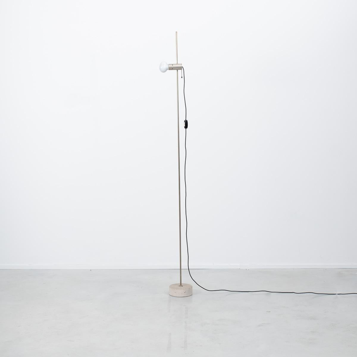 Model 387 floor lamp by Tito Agnoli for Oluce, Italy, 1954. Early edition, featuring a nickel-plated steel pole with original Cornalux ‘hammerhead’ light bulb on a travertine base. Pair available.

Patina of age. Original bulbs. Rewired and PAT