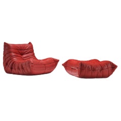 Original Togo & poof (2007) in red leather by Michel Ducaroy for Ligne Roset.