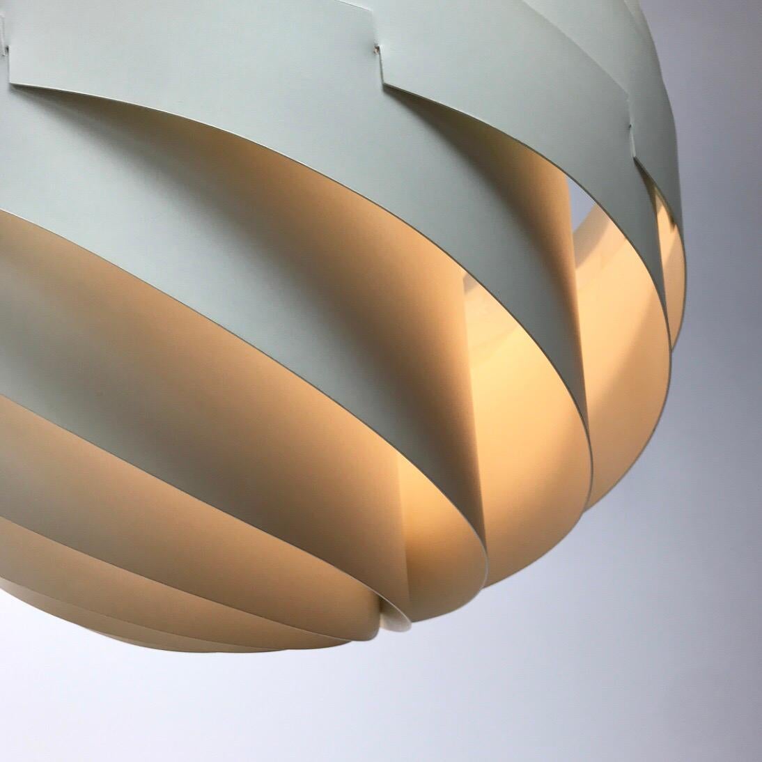 Iconic danish midcentury ceiling light Turbo designed in 1965 by Louis Weisdorf,
Denmark.

A real collectors choice. Newly relaunched but this piece is the real deal which makes it a very high sought design light. 

Weisdorf used Japanese