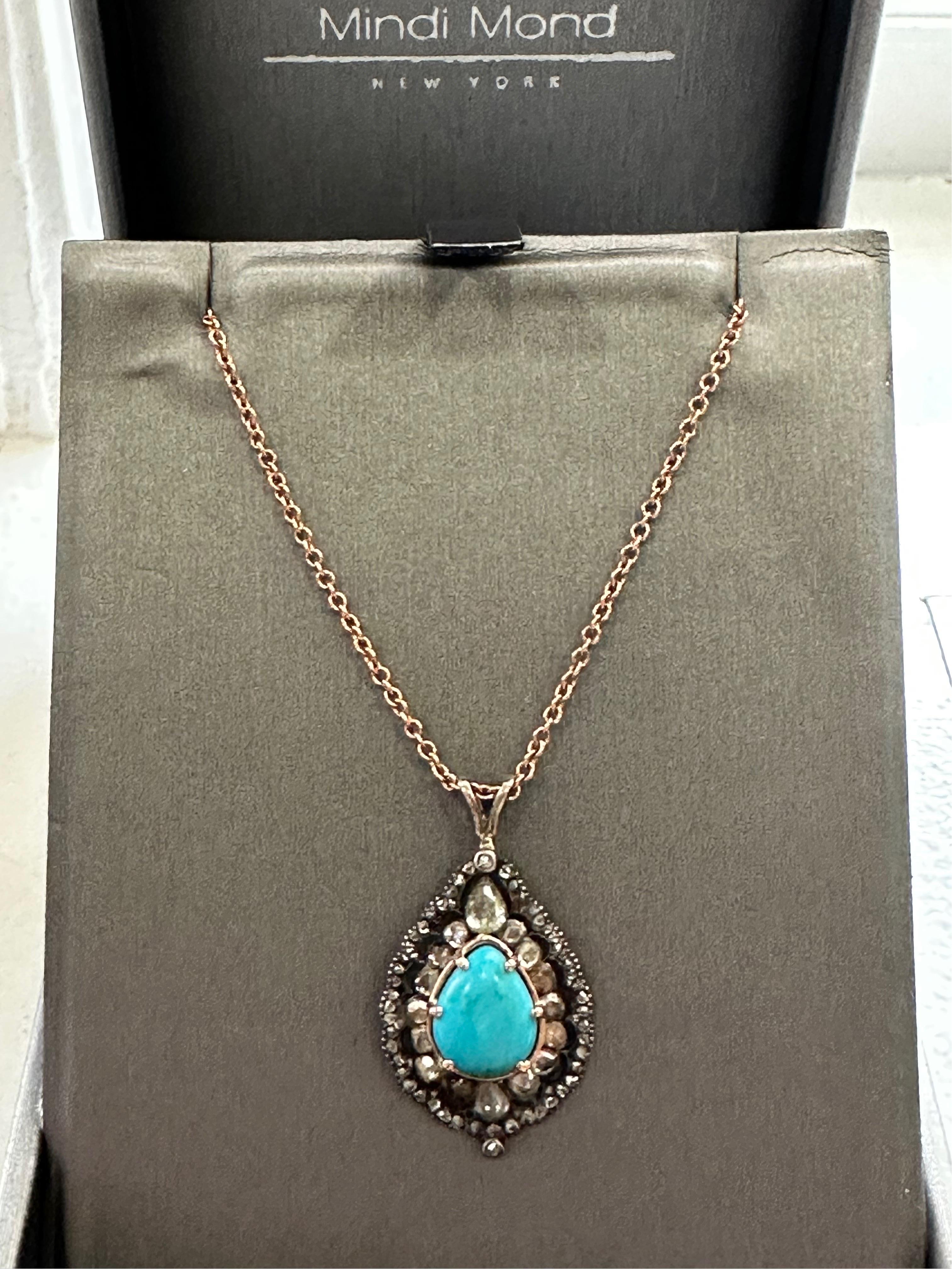 Original Victorian Turquoise Rose Cut Diamond Pendant. An array of old rose cut diamonds surrounding vibrant pear shaped turquoise set in silver and 14k rose gold. 
A new 16 inch rose gold chain. (14k)