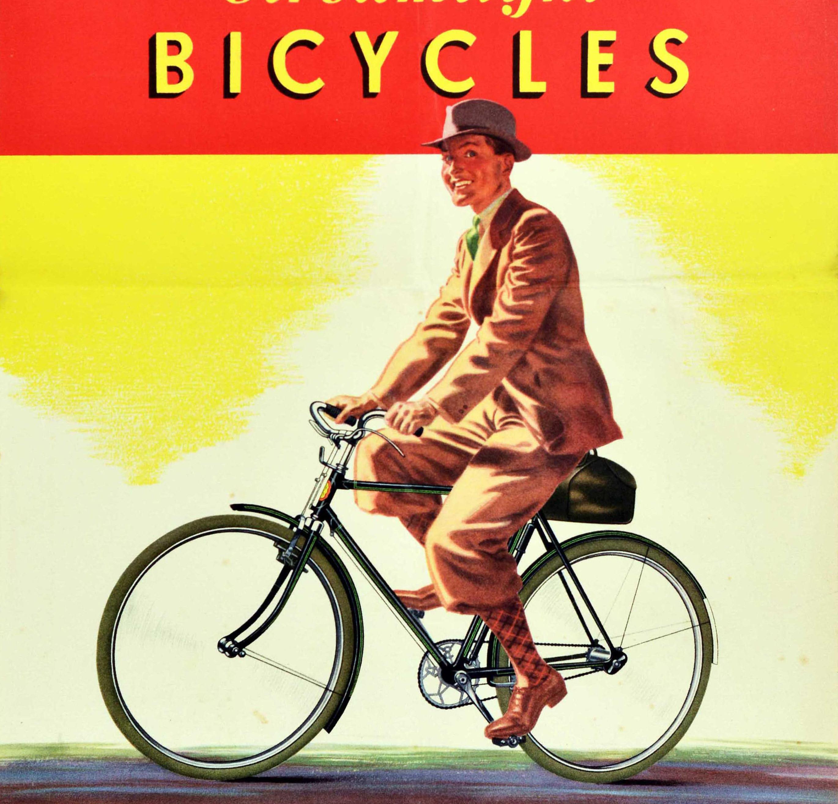 Affiche publicitaire originale pour BSA Streamlight Bicycles, représentant un cycliste élégamment vêtu, souriant au spectateur alors qu'il roule sur son nouveau vélo, sous le texte en caractères jaunes gras sur fond rouge. Fondée en 1861, la