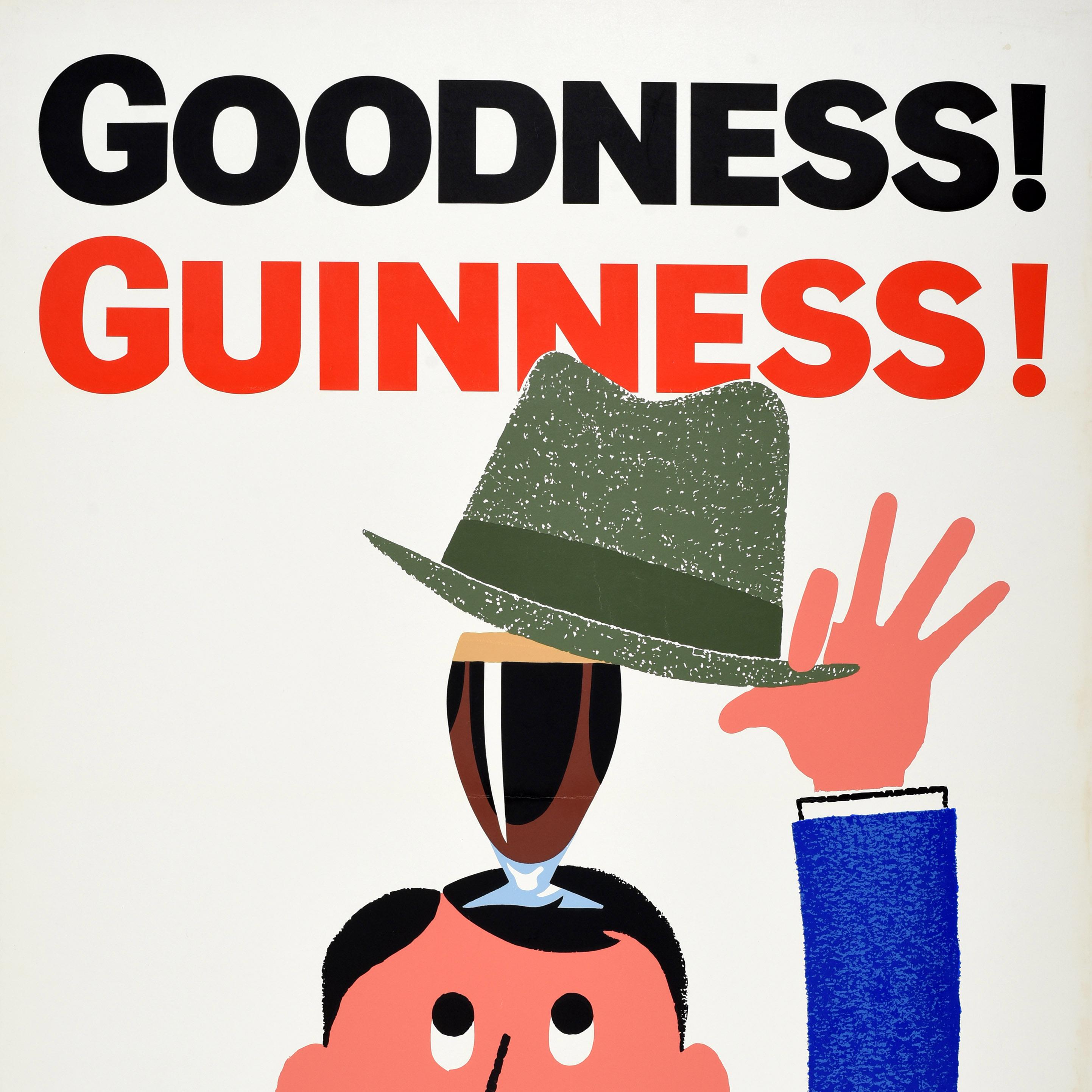 Affiche publicitaire vintage originale pour la boisson emblématique qu'est la bière stout irlandaise Guinness - Goodness ! Guinness ! - avec un design amusant représentant un homme portant un costume bleu et une cravate rouge qui soulève son chapeau