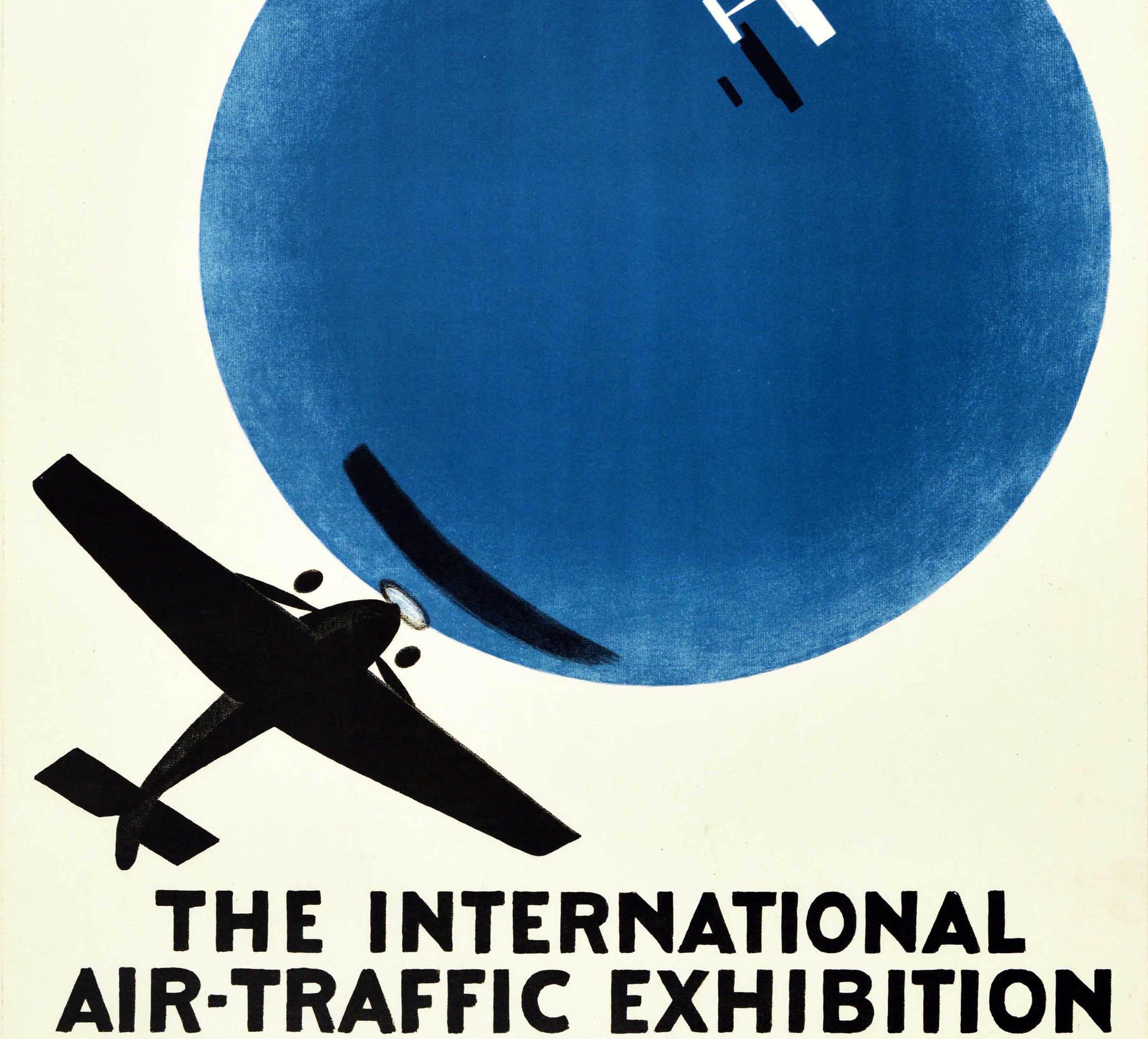 Original vintage advertising poster for The International Air Traffic Exhibition Copenhagen Forum 20 August 2 September 1927 aviation event featuring an Art Deco design of planes flying around a blue globe of the earth with a red and white Danish