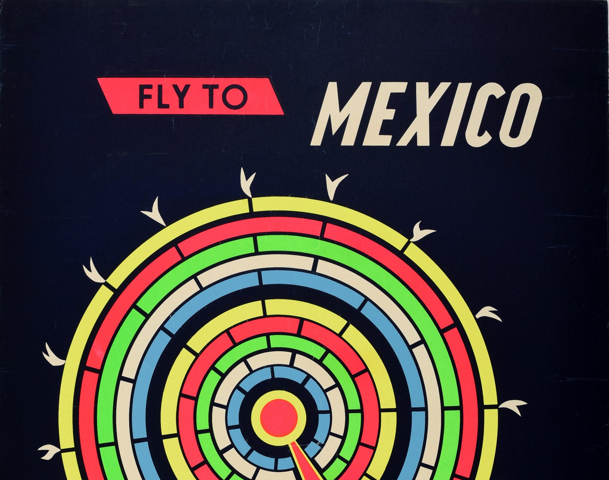 Original vintage travel poster - Fly to Mexico - issued by Aeronaves De Mexico (Aeromexico; founded 1934) featuring a modern design depicting a man in traditional clothing walking in front of a colourful Mayan calendar circle against the dark