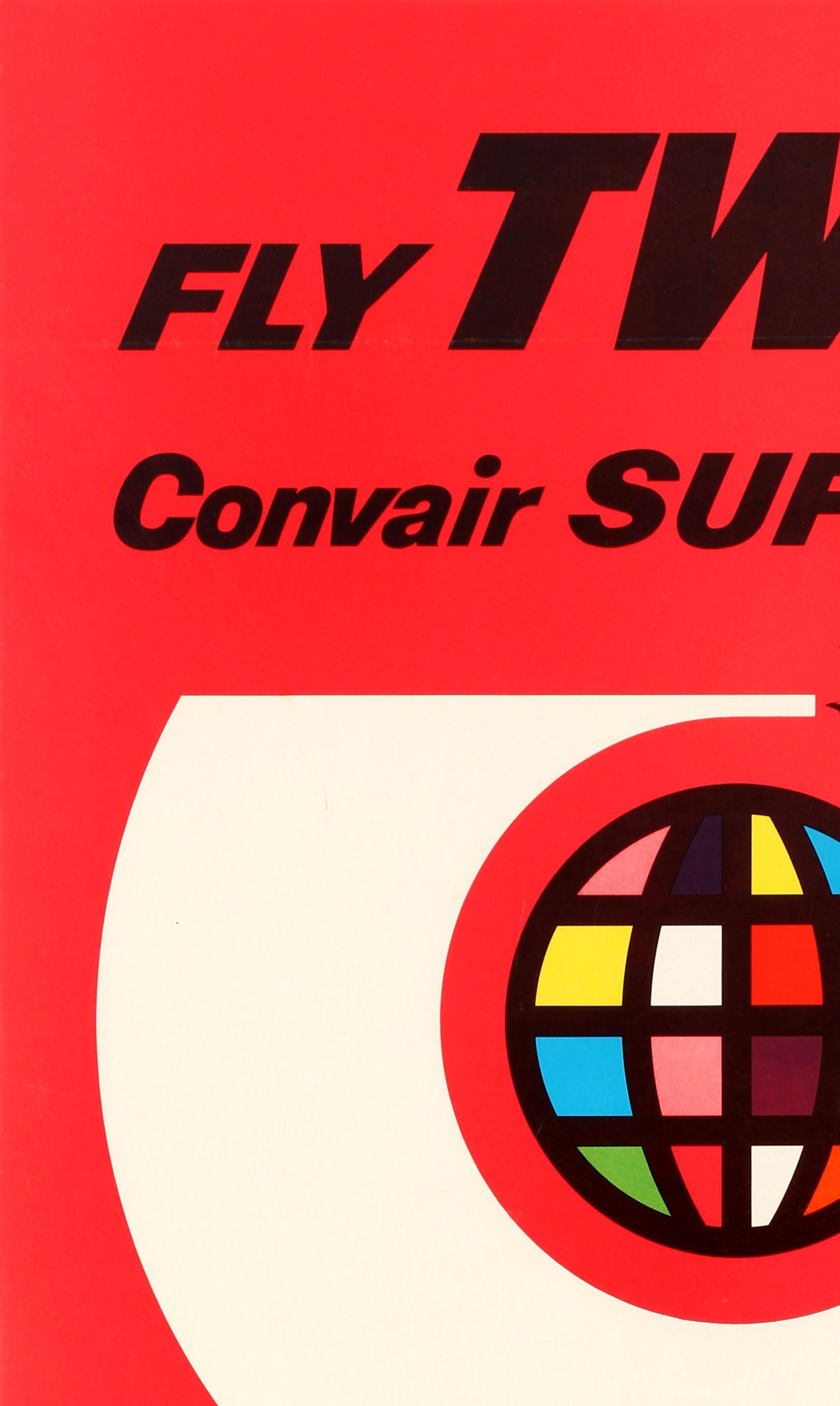 Original vintage TWA poster advertising Convair Superjet flights. Great graphic modernist illustration featuring a plane circling a multicolored globe leaving a white trail, against the bold red background with the text above and below: Fly TWA