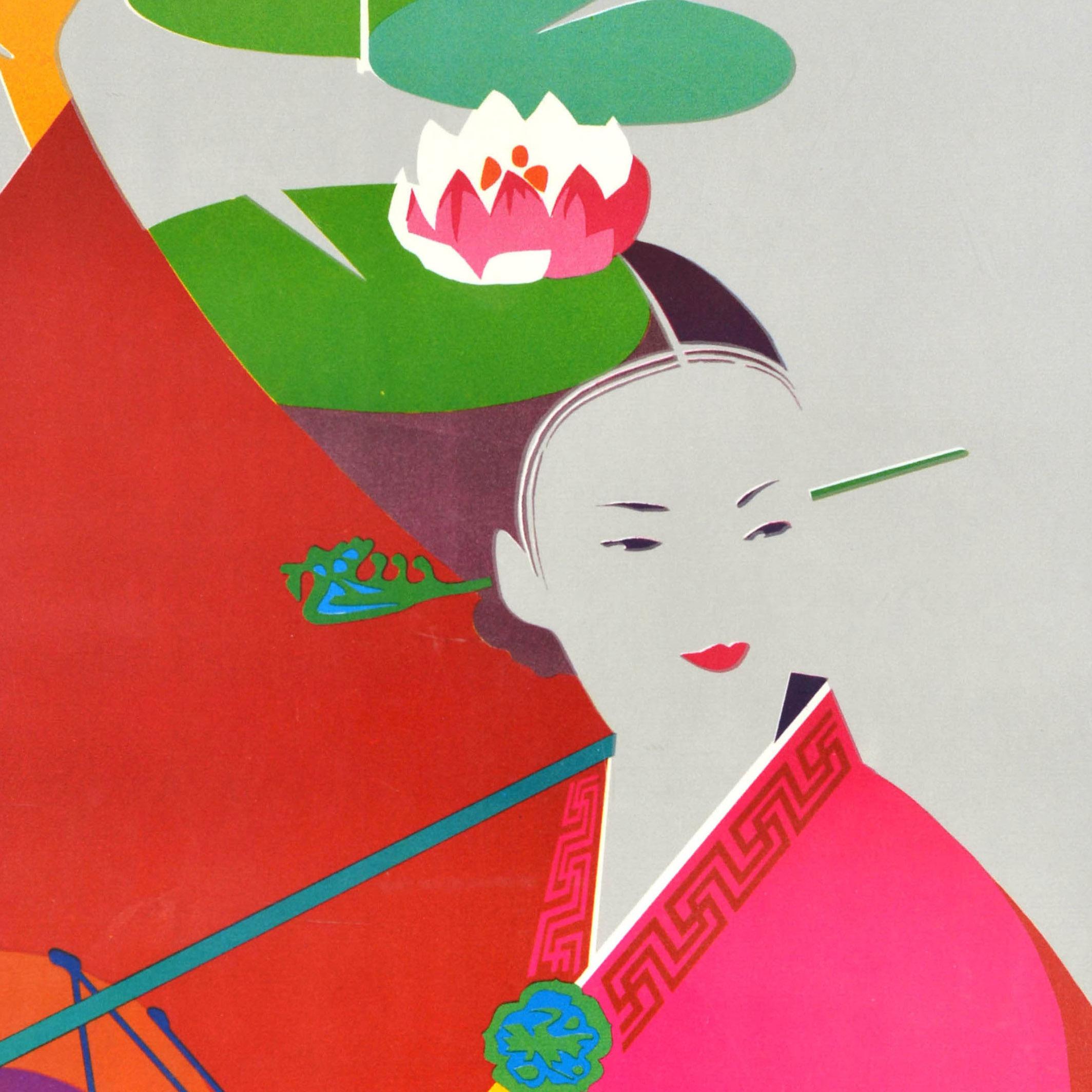 Original vintage Asia travel poster for Korea featuring a colourful design of a lady dressed in a traditional red and pink Hanbok dress playing a Korean drum / buk with water lilies on a grey background, the title text in blue above. Published by