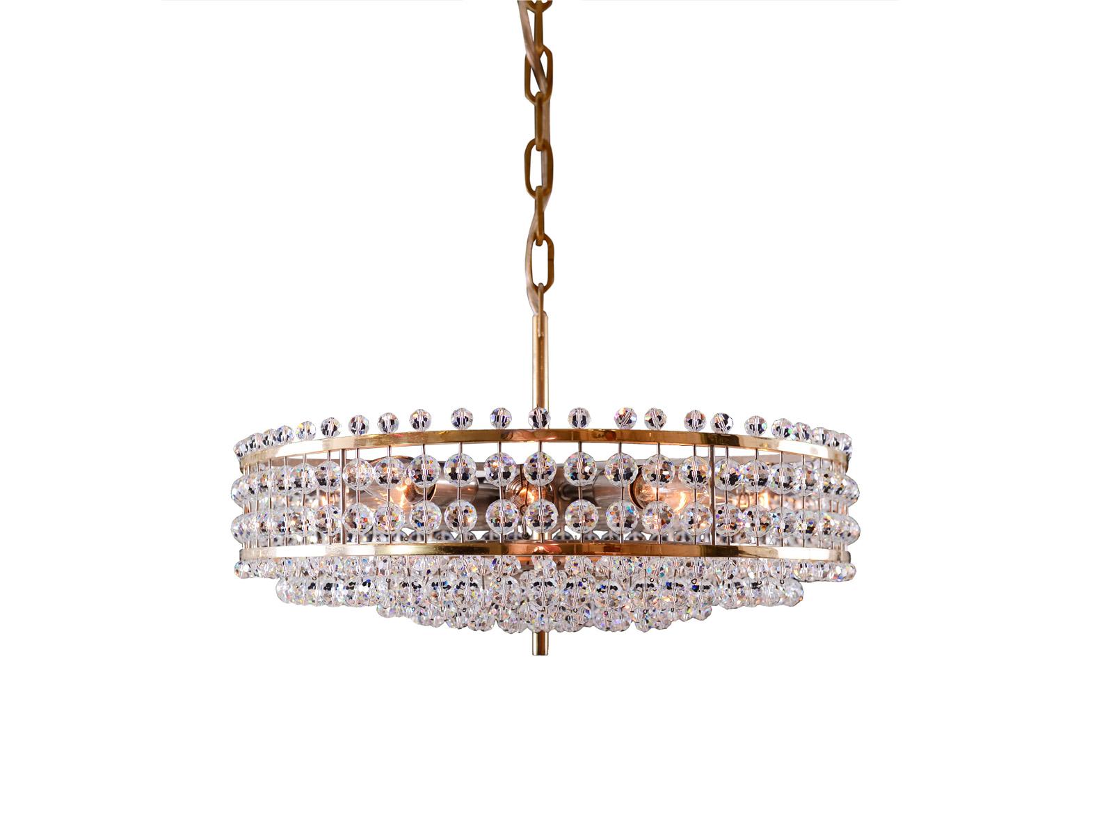 A very charming Bakalowits chandelier from the 1960s, 12 flames, the height is just the chandelier.
Materials & Techniques Notes: brass and hand-cut crystal-glass
Suitable for the US.