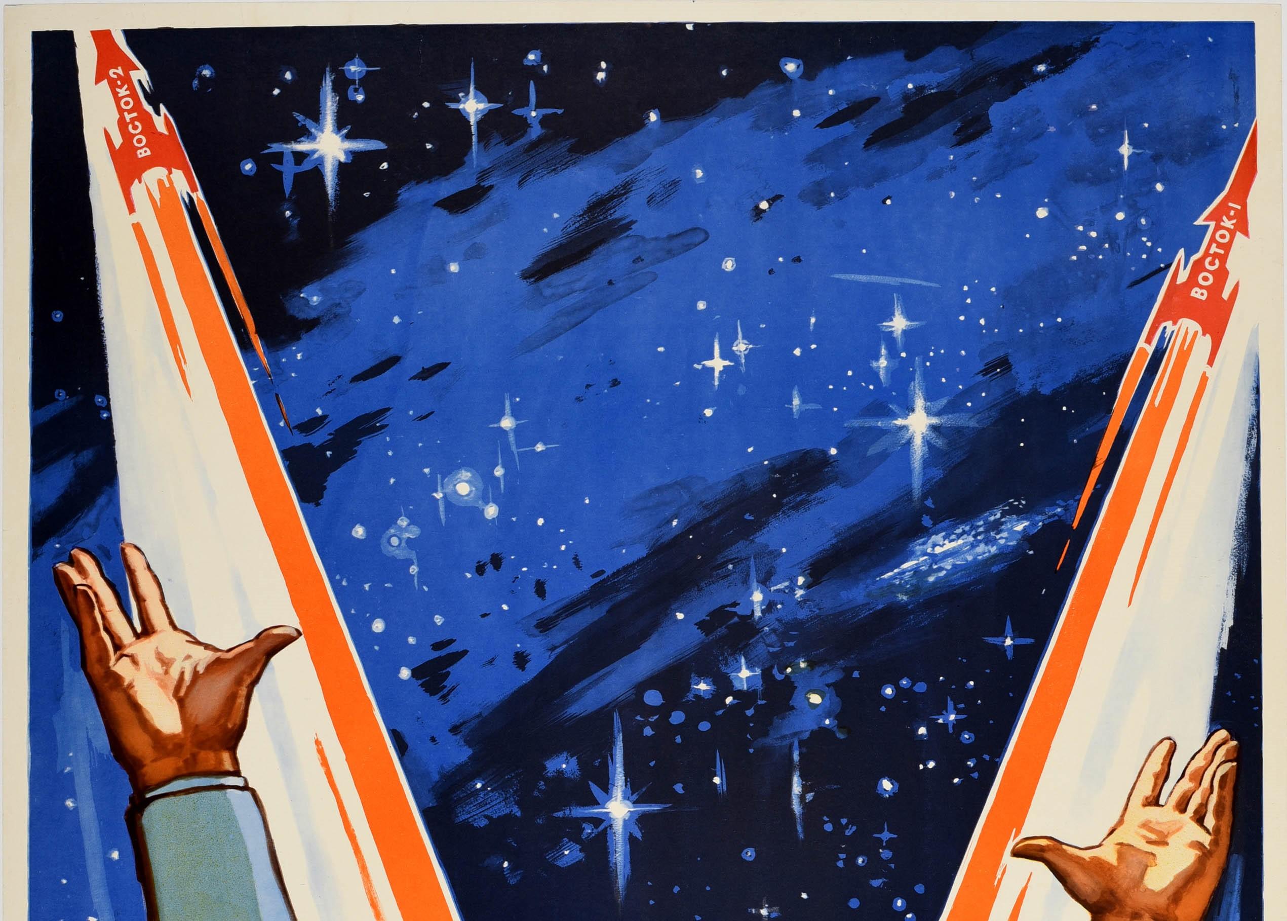 Original vintage Soviet propaganda poster - For the Glory of Communism! / Во Славу Коммунизма! - featuring a space illustration depicting a smiling cosmonaut pilot in uniform holding up his arms in front of a starry sky with two rockets flying up -