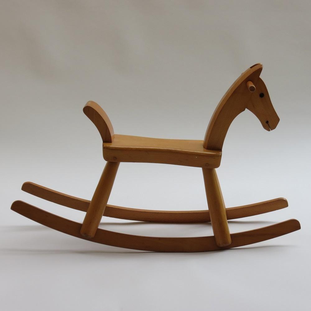 Original vintage Kay Bojesen rocking horse. Made from solid beech with a lacquered finish. Stamped to underside Kay Bojesen, Denmark.
Original design 1936; this one dates from the 1960s.


