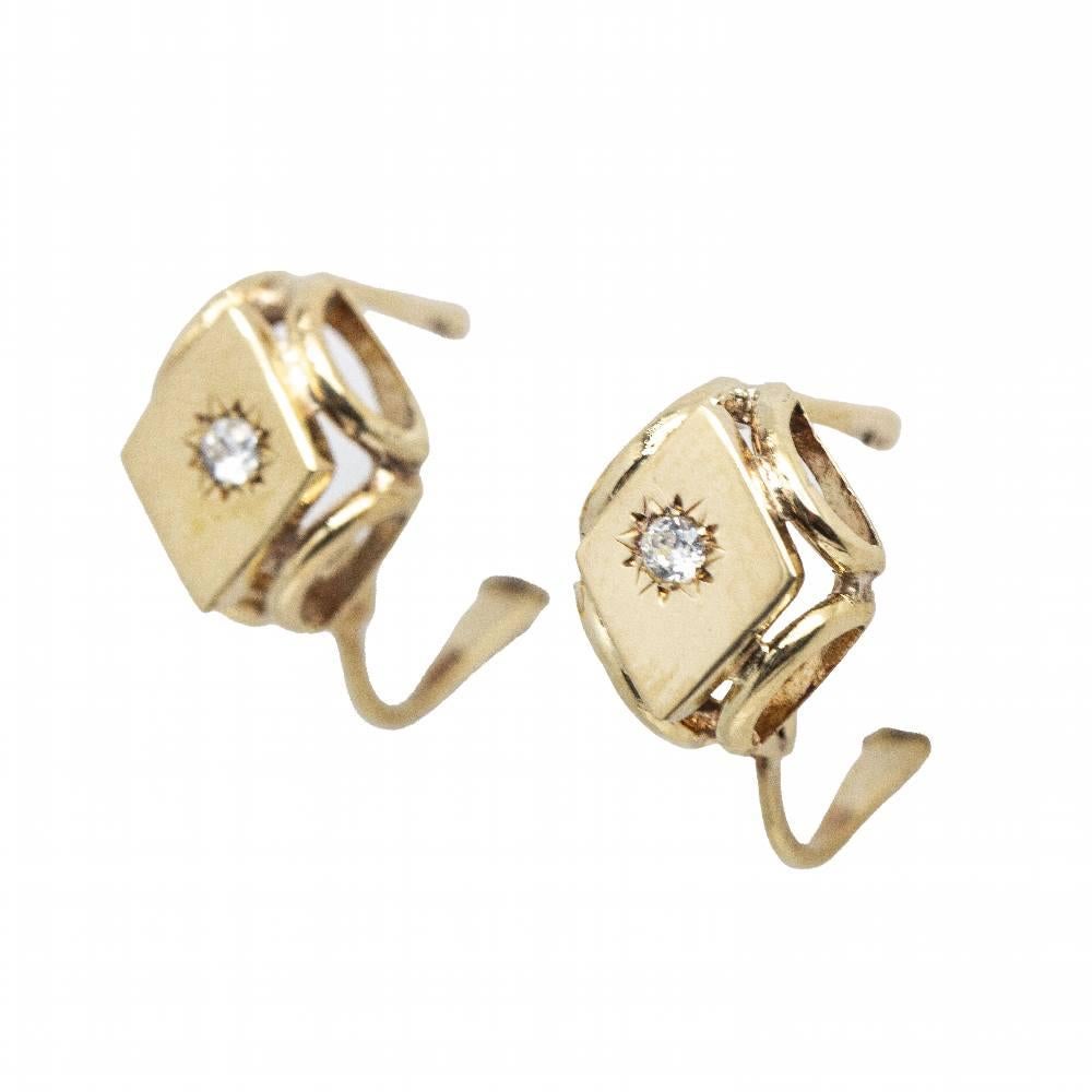 Vintage Vintage earrings in Yellow Gold for woman  2x Antique Cut Diamonds  Catalan clasp  18kt Yellow Gold  1,41 grams  Measures: 10mm long and 9mm wide  These earrings are in excellent condition, without any visible wear and tear  Ref.D361036JC