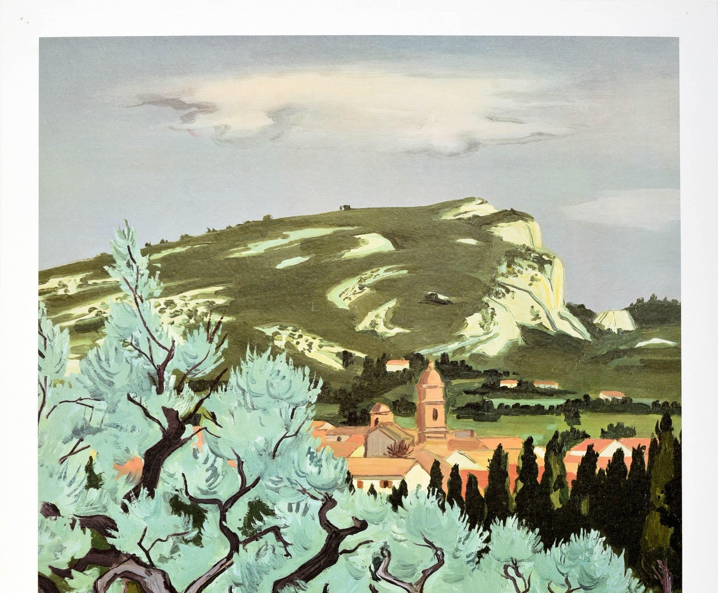 Original vintage travel poster for Provence by Yves Brayer (1907-1990) Discover France by Train French National Railroads featuring a scenic painting of the countryside showing trees by a rocky path in the foreground leading to a village with hills