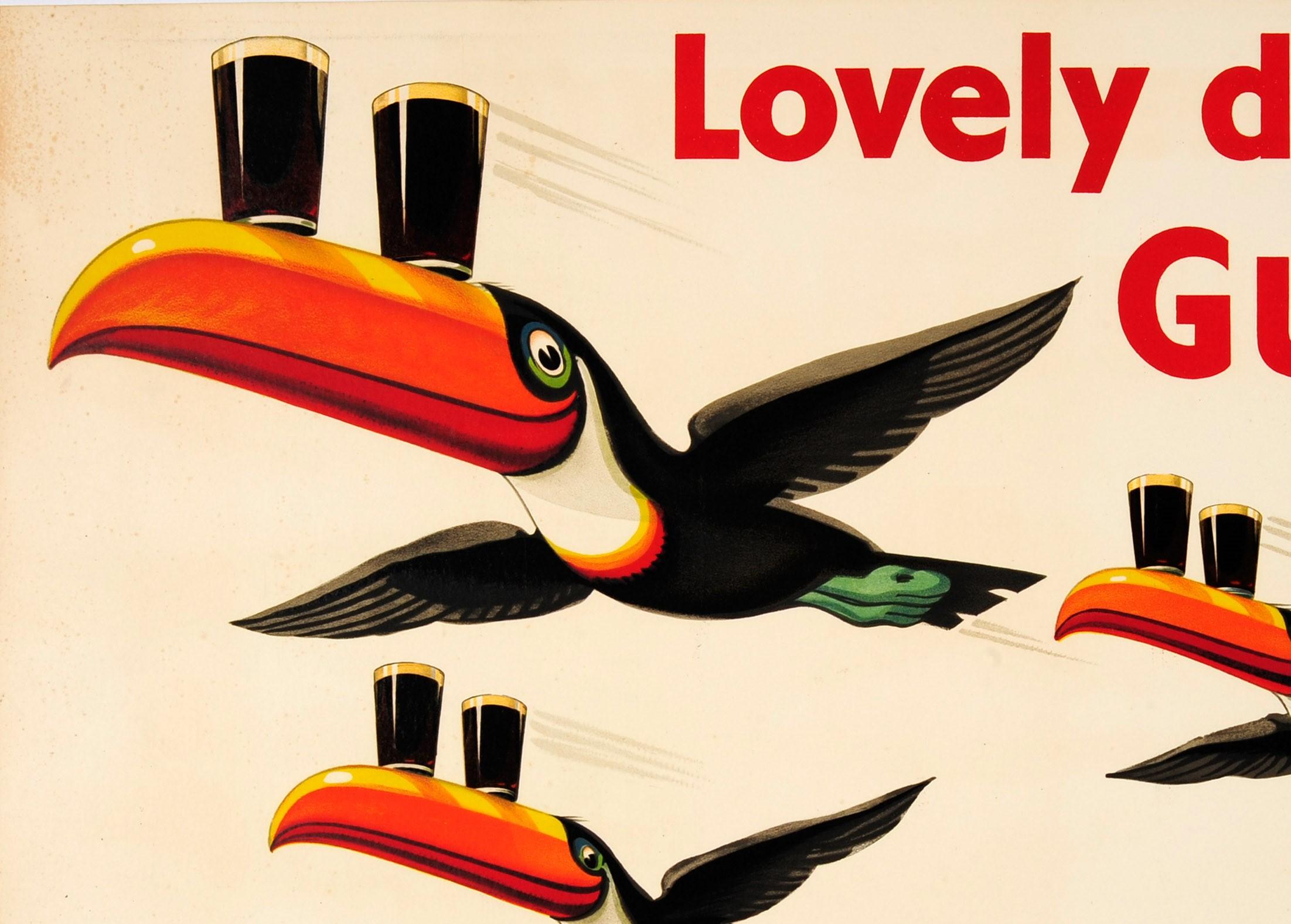 Original vintage Guinness advertising poster - Lovely Day for a Guinness - featuring an iconic design by the notable artist John Gilroy (John Thomas Young Gilroy; 1898-1985) depicting the brand's trademark smiling toucans flying in formation over a