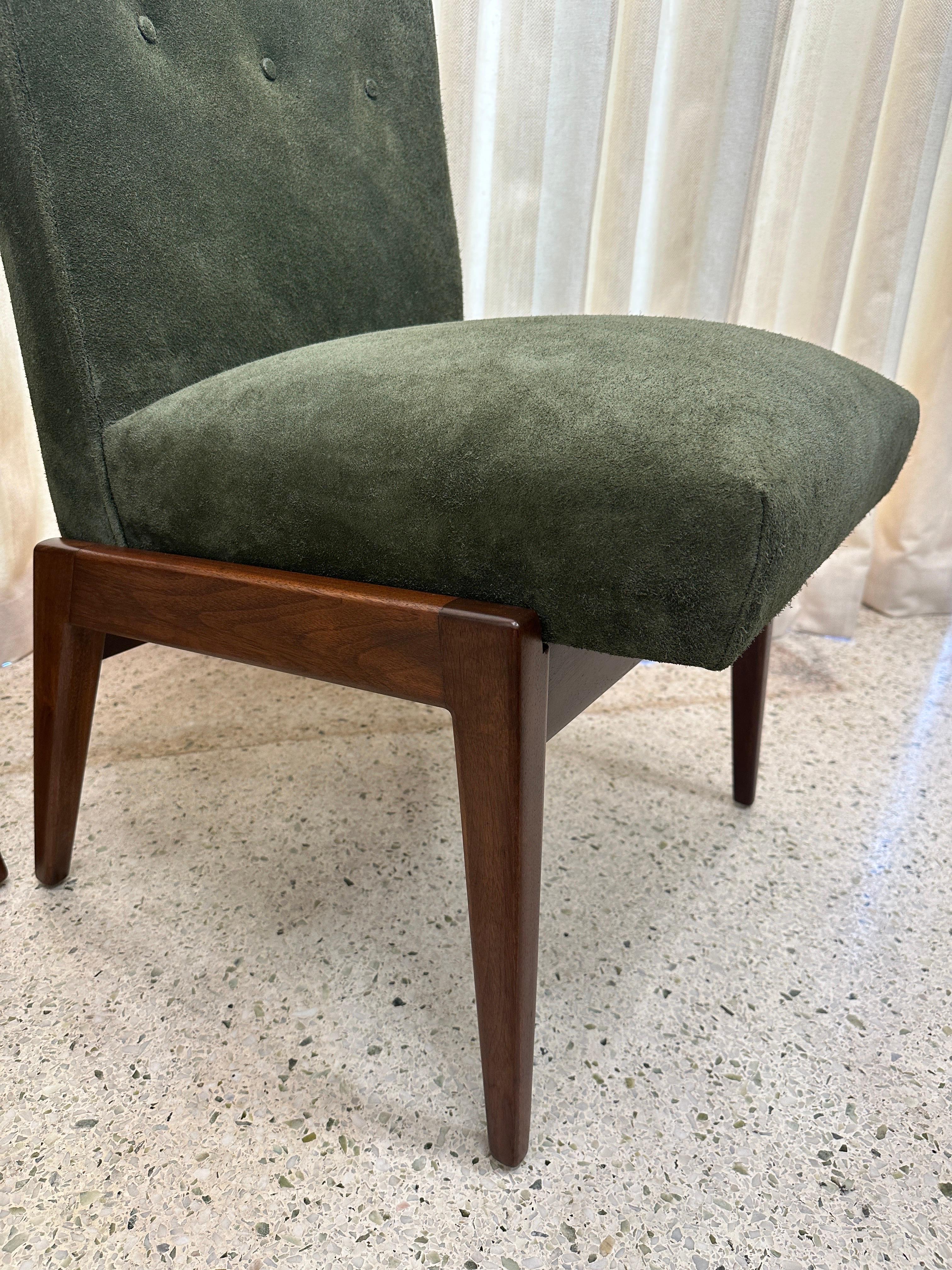 Wonderful authentic labelled vintage Jens Risom chairs in Walnut frame and upholstered in a sumptuous Rolex green suede.  The walnut frame has been lovingly refinished to its original luster.  THIS ITEM IS LOCATED AND WILL SHIP FROM OUR MIAMI,
