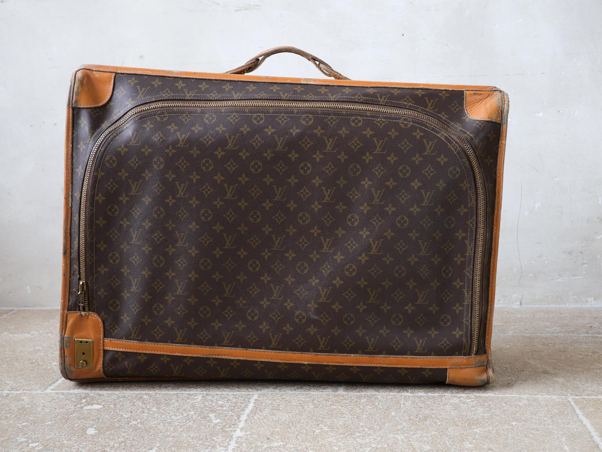 Leather Original vintage Louis Vuitton suitcase, from the 1970s For Sale