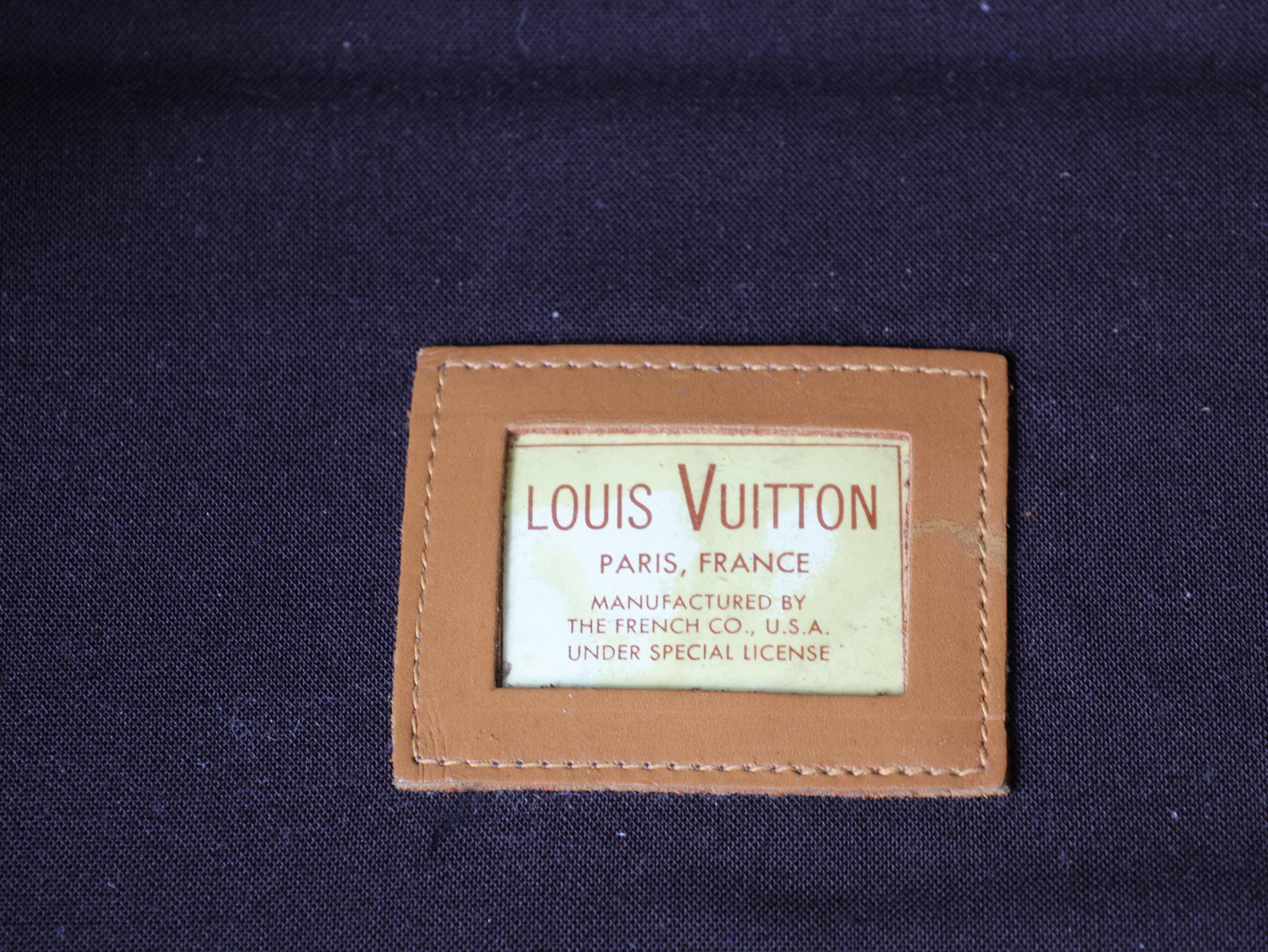 Leather Original vintage Louis Vuitton suitcase, from the 1970s For Sale