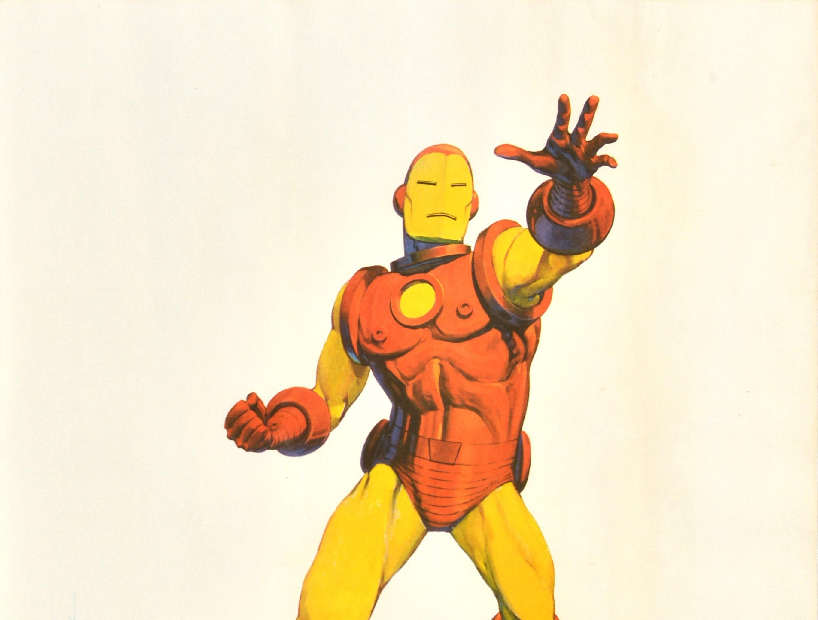 Original vintage animated action adventure movie poster featuring the Marvel Comics superhero Iron Man reaching forward with his other hand in a clenched fist, the title in bold blue text below. Created by Stan Lee with Larry Lieber and cartoon