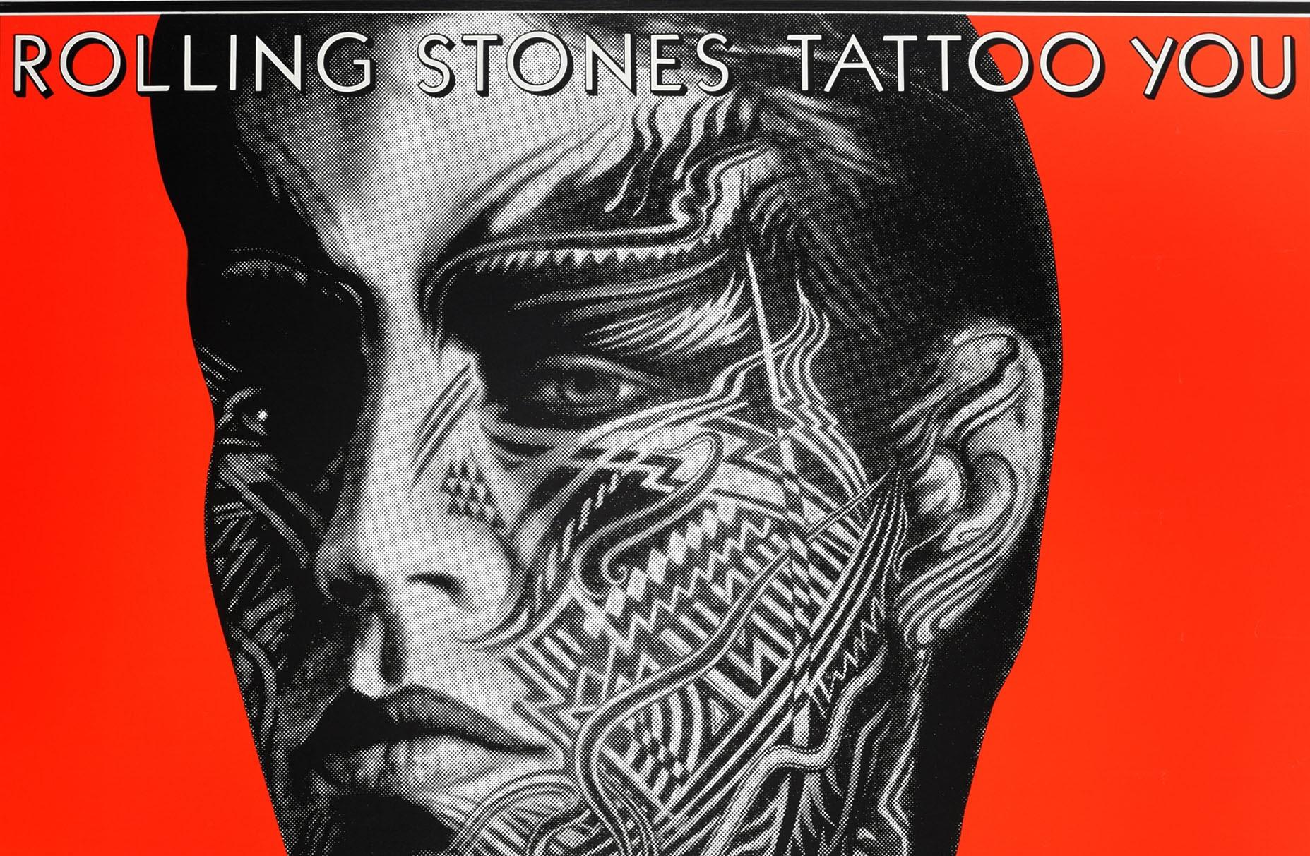 Original vintage music advertising poster for tattoo You by the Rolling Stones featuring the award winning album cover design by the graphic designer Peter Corriston working with photographer Hubert Kretzschmar and illustrator Christian piper