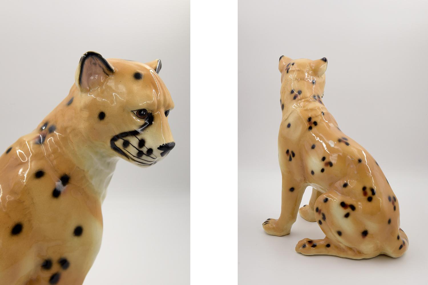 This large figure of a cheetah probably was produced in Italy during the 1970s. The figure is made of high-quality hand-painted ceramics in intense shades of orange. The cheetah is perfect for the office or living room, and as a complement to the