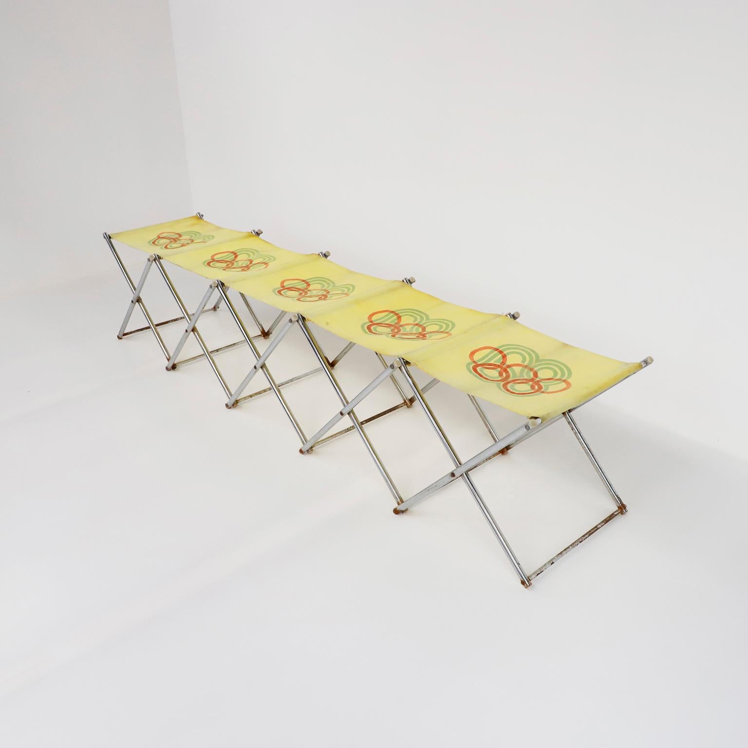 Original vintage Olympic folding bench for 5 seats Mexico 68 with graphic design lines logo. Officially known as the Games of the XIX Olympiad held from 12-27 October 1968, featuring the iconic eye-catching event logo design by the notable American