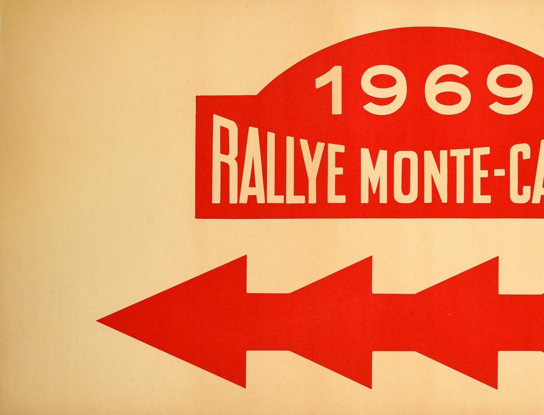 Original vintage motor sport poster for the 1969 Rallye Monte-Carlo featuring iconic logo with the stylised lettering against the red background above a bold red line with four arrows pointing left. Held since 1911, the annual Monte Carlo Rally /