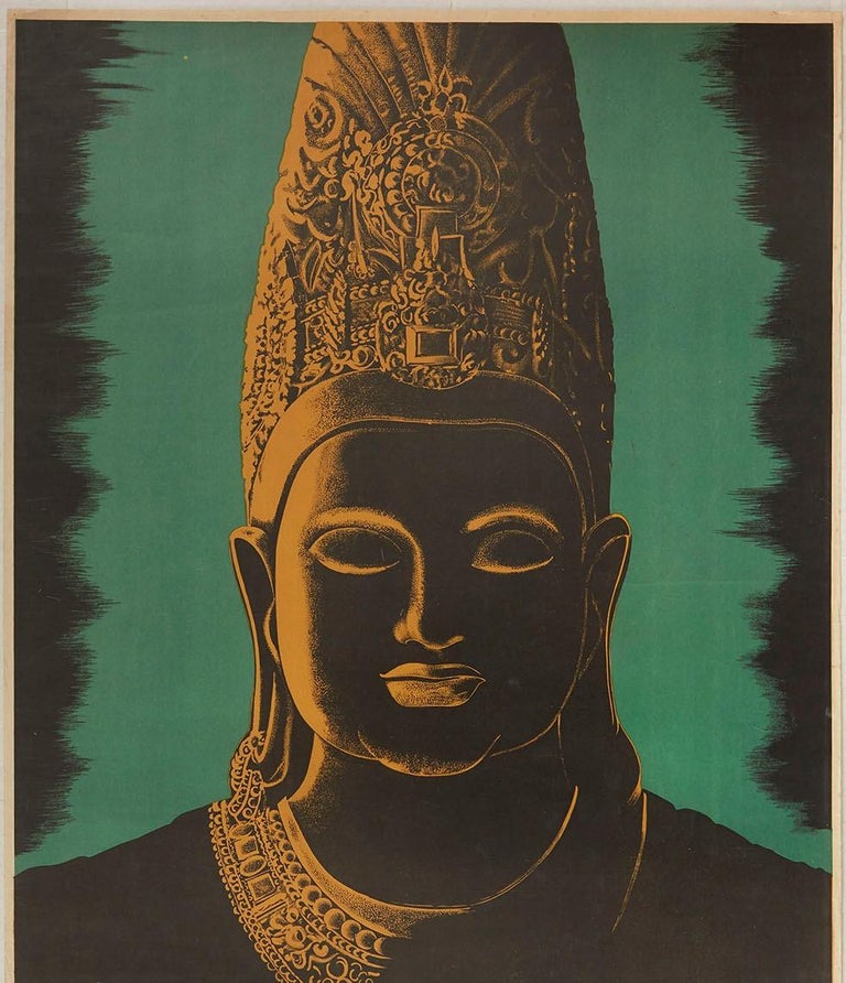 Original vintage travel poster for India by Air-India International featuring an ancient Indian Buddha head sculpture with the light on one side highlighting the decorative detail on the ornamented crown and necklace in front of a dramatic green and