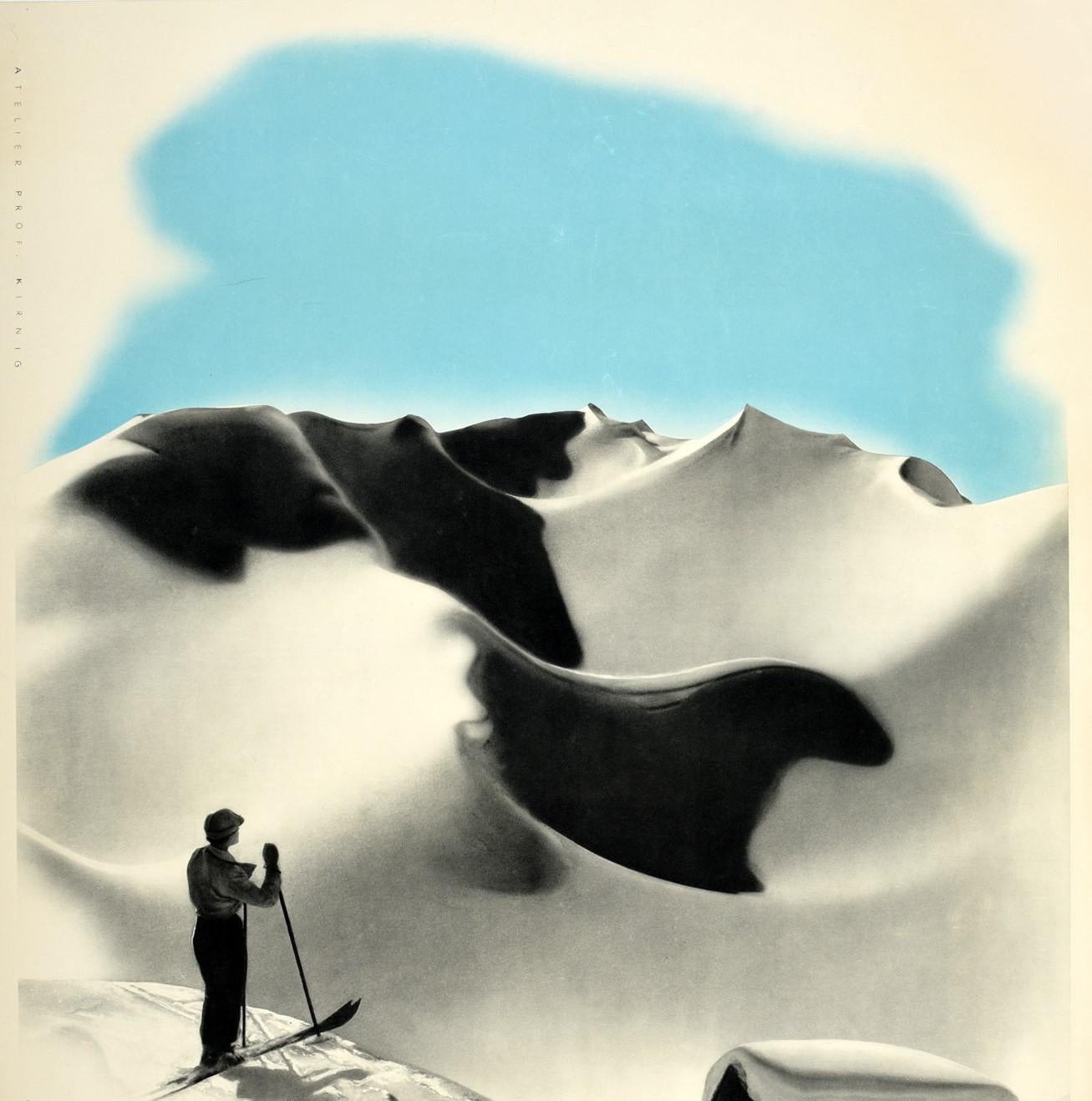 Original vintage winter sport skiing poster for Austria featuring a scenic view in black and white by Atelier Prof. Kirnig (Paul Kirnig; 1891-1955) of a lady standing on skis at the top of a slope and leaning on her ski poles, looking out over a