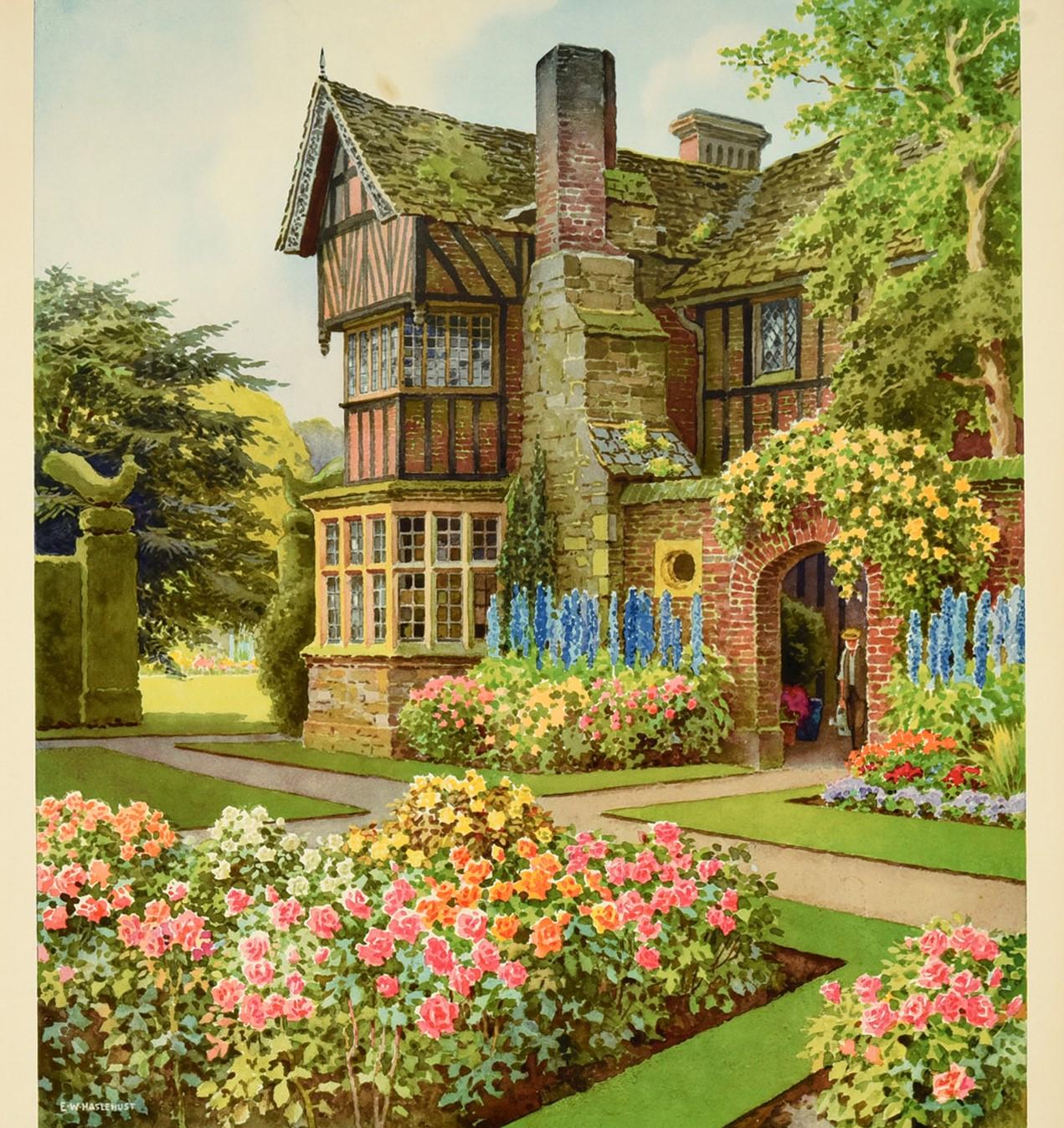 Original vintage travel poster - Britain in Summer - featuring a great image by the watercolour painter Ernest W. Haslehust (1866-1949) of a traditional English country manor house with colourful flower beds in a neatly landscaped garden with shaped