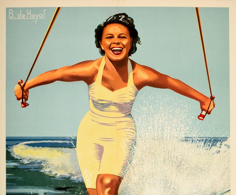 Original vintage travel poster for Great Summer holidays Cadiz The best beach in the South / Grandes fiestas veraniegas Cadiz la mejor playa del sur featuring a great image of a smiling lady kitesurfing on a board at sea with the bold lettering