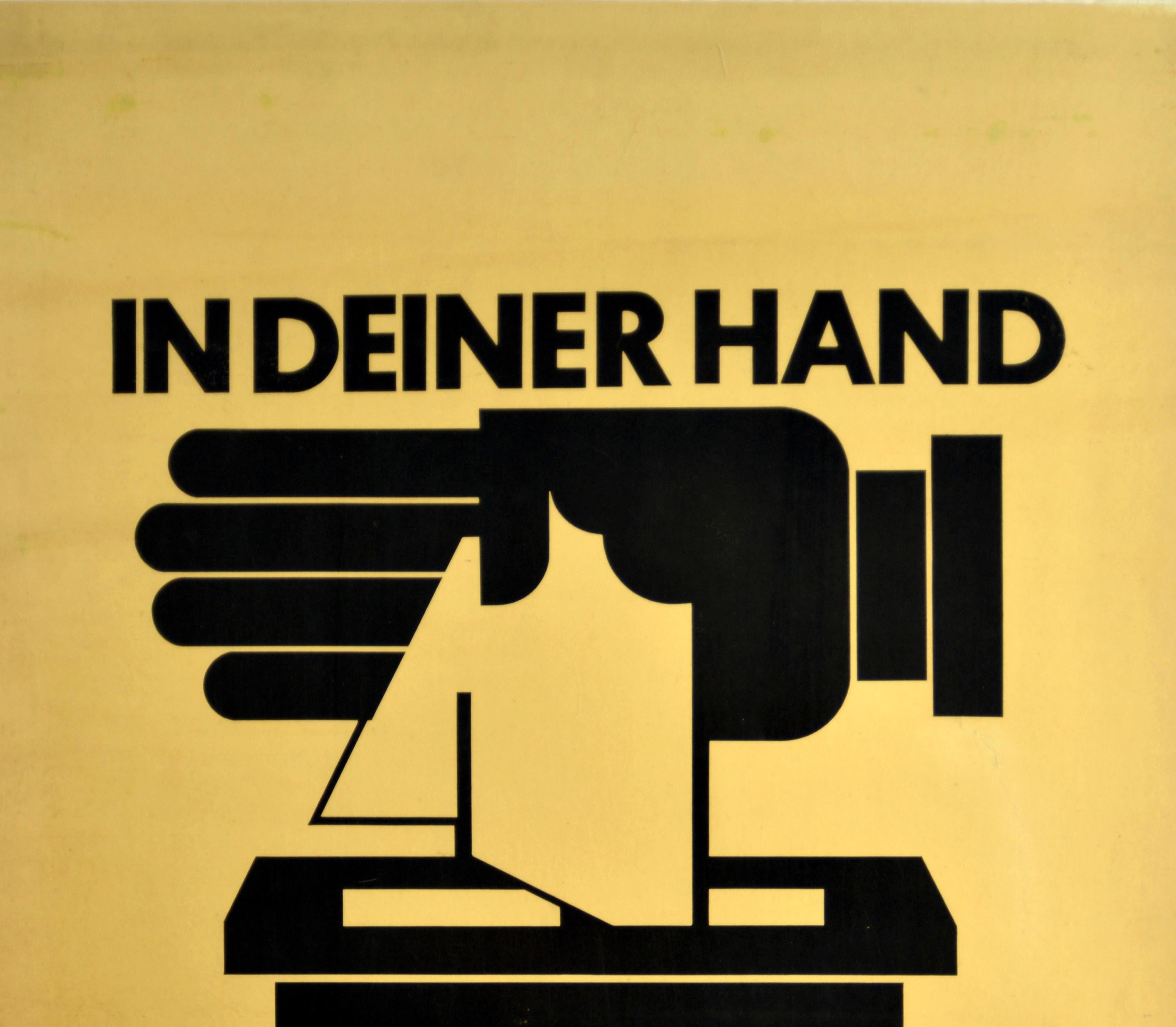 Original vintage hygiene and health propaganda poster - Cologne's Cleanliness In Your Hands / In Deiner Hand Kolns Sauberkeit - featuring a great Bauhaus style graphic design of a hand dropping a tissue in a rubbish bin with the bold black lettering