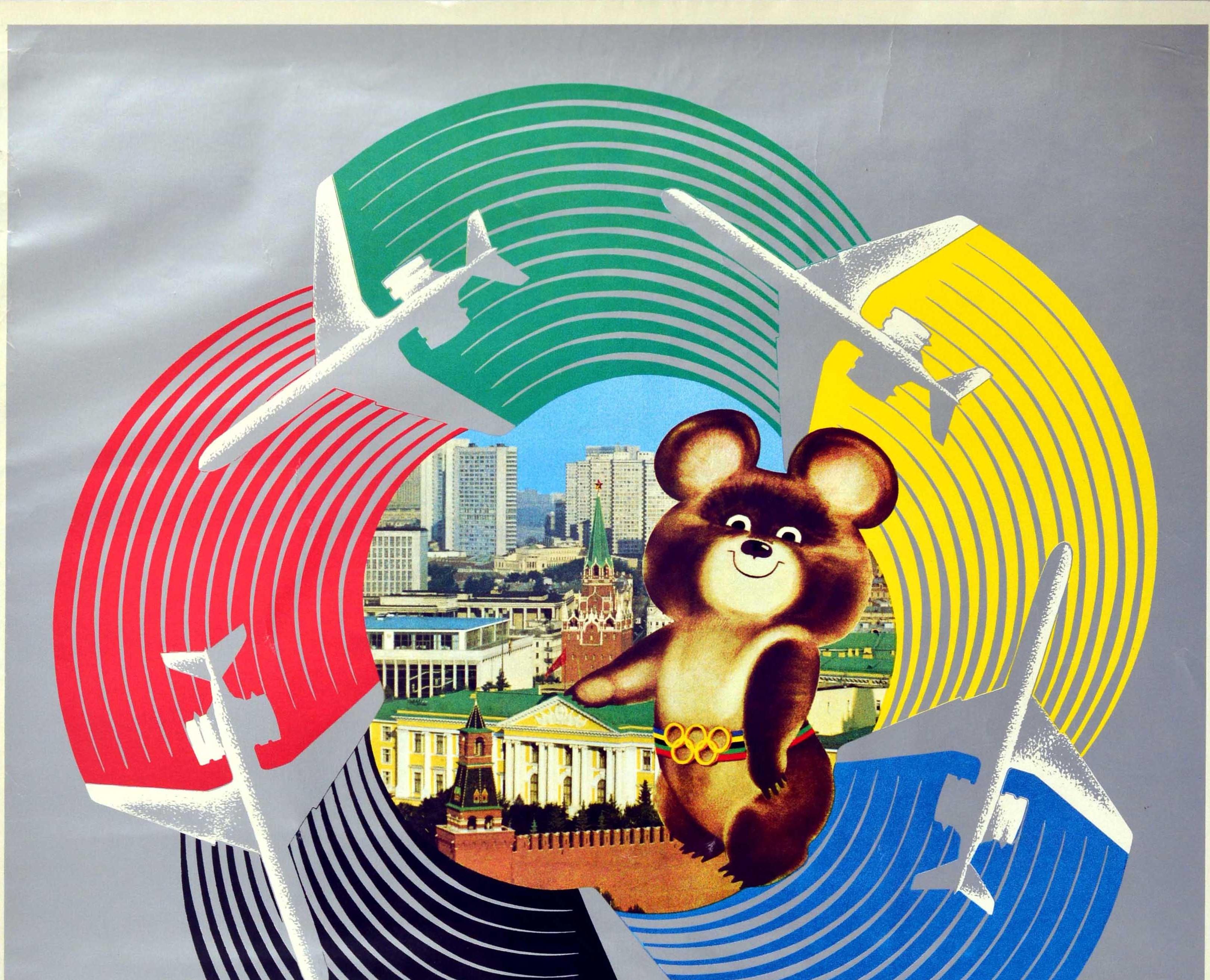Original vintage sport travel poster for the Official Olympic Carrier Aeroflot Soviet Airlines featuring a fun and colourful illustration depicting the smiling bear Misha the Moscow Olympic Games mascot (designed by the children's book illustrator