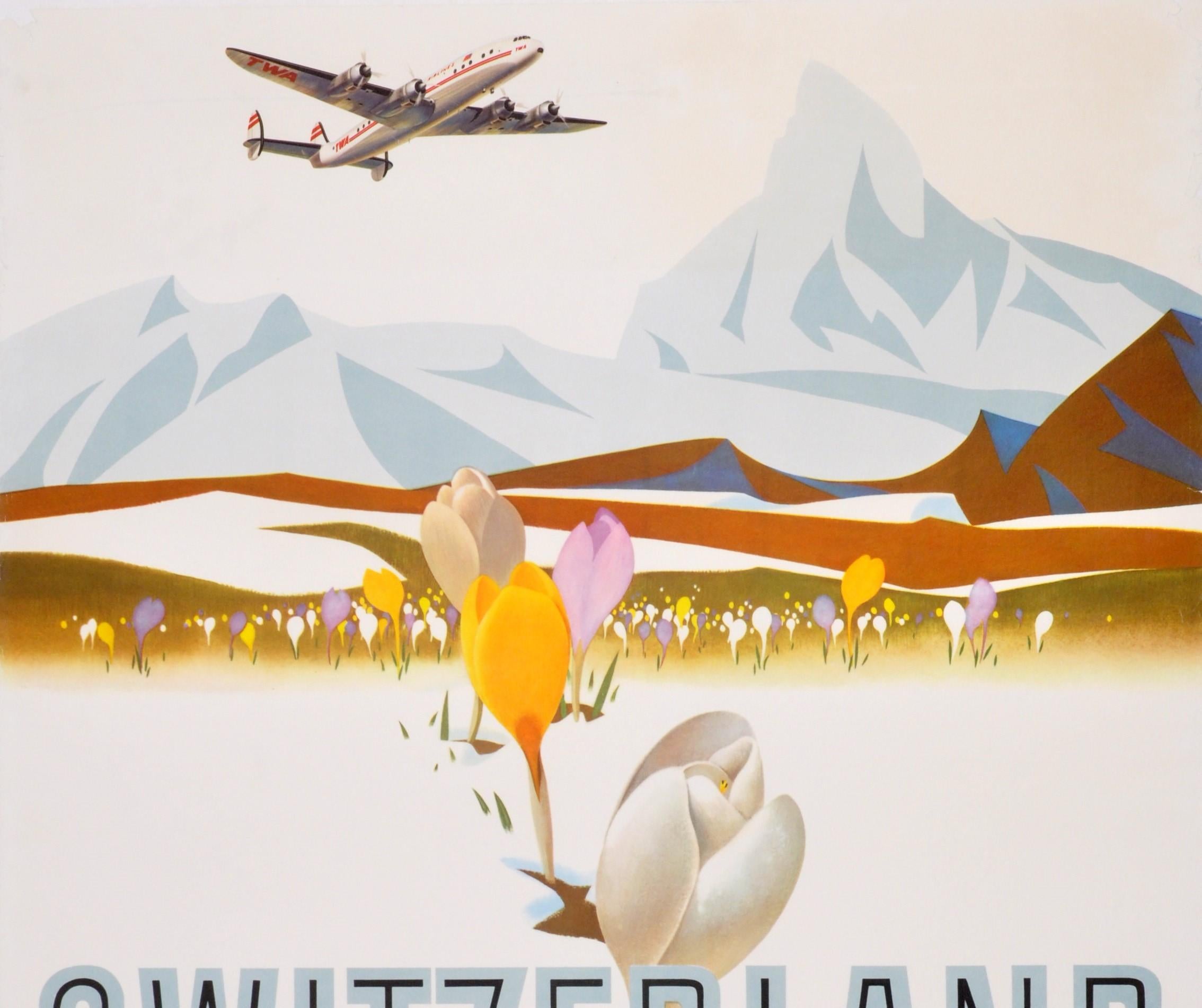 Original vintage travel poster for Switzerland Fly TWA designed by renowned American artist David Klein (1918-2005) most noted for his Trans World Airlines poster artwork. Great design showing colourful spring crocus flowers in the foreground