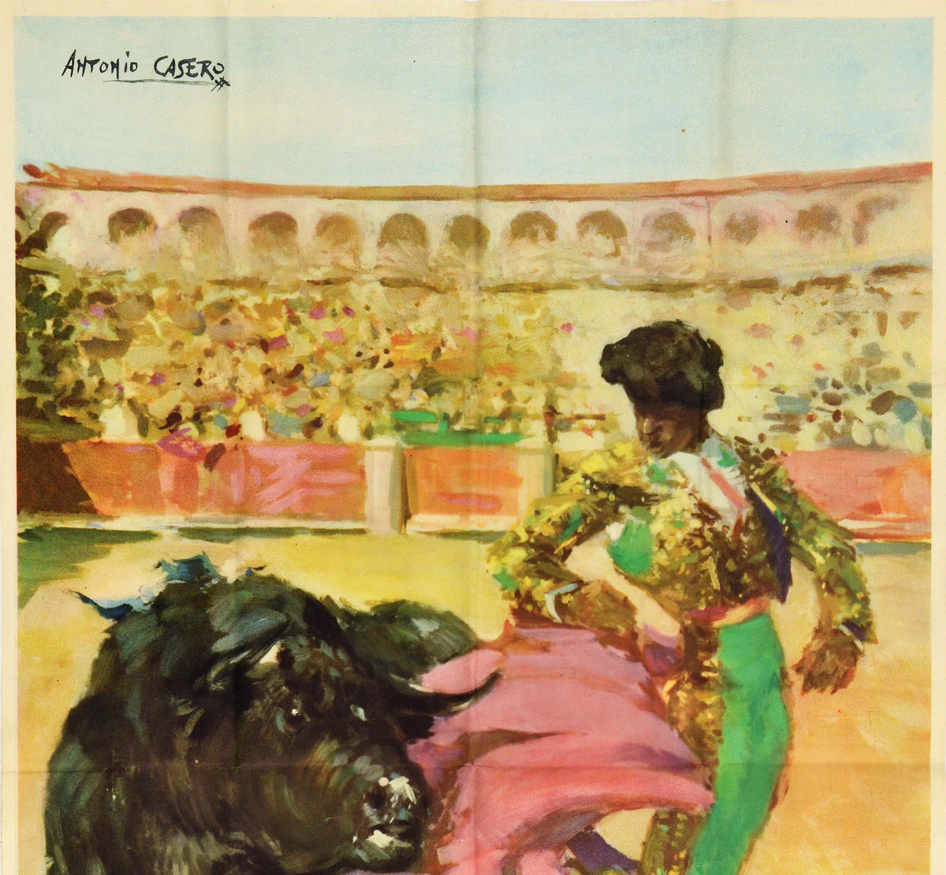 Original vintage travel poster advertising The Fiesta de Toros in Spain featuring a colourful design by Antonio Casero (1897-1973) of a bull fight with the torero / matador in a gold and green outfit being circled by a bull in a bullring arena full