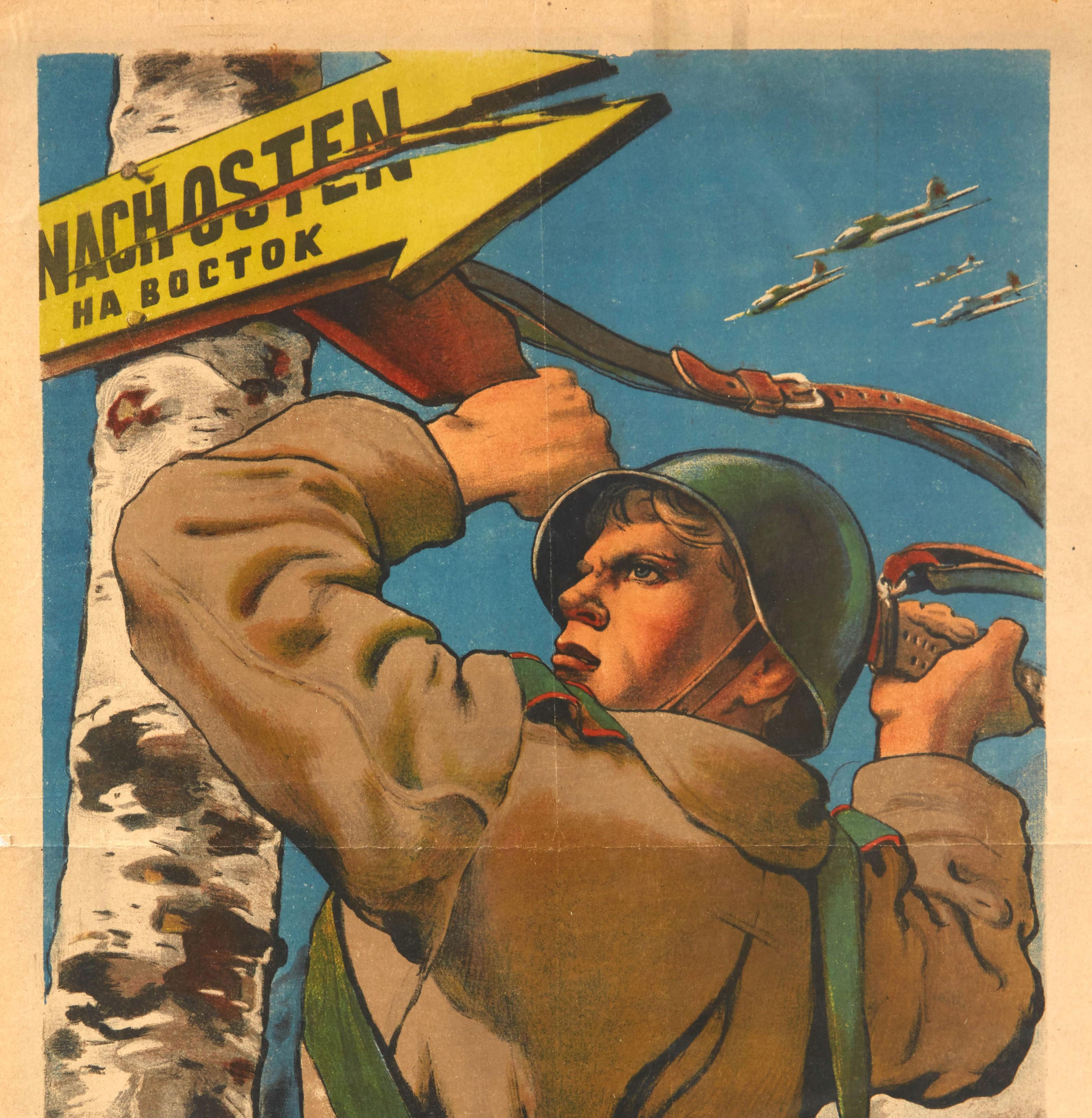 Original vintage World War Two Soviet propaganda poster depicting a soldier using his rifle gun to break down an arrow sign - Nach Osten ?? ?????? (Na Vostok / To The East) - nailed to a silver birch tree by the German forces pointing towards Russia