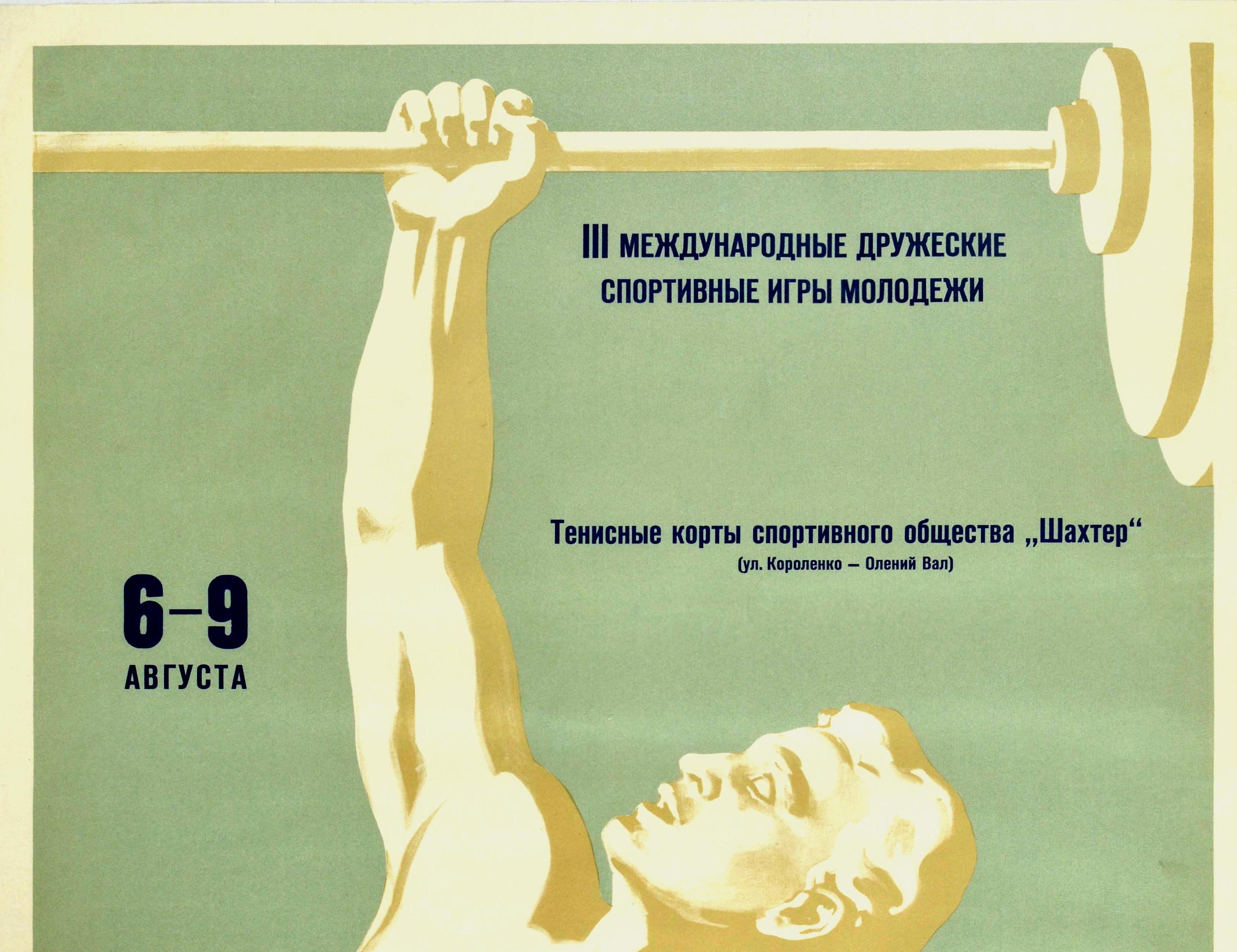 Original vintage sport poster for a weightlifting competition at the III International Friendship Moscow Youth Games held from 6-9 August 1957 at the tennis courts of the Shakhter / Miner Sports Society on Korolenko Ulitsa / Street featuring a