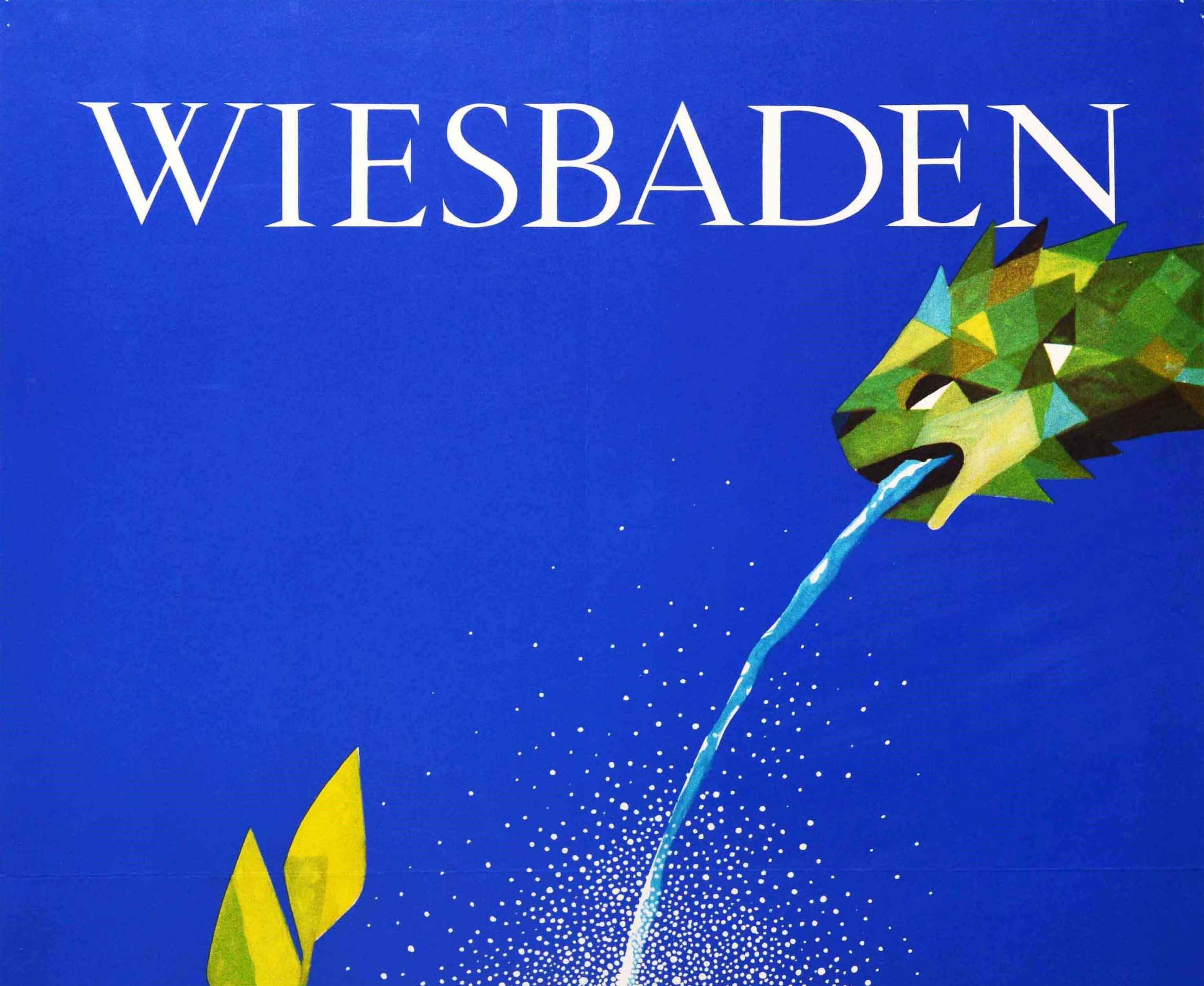 Original vintage travel poster for Wiesbaden featuring a great illustration of an animal head fountain pouring water into an elegant blue vessel with a wave pattern on it, a green branch below against a blue background. Text in white above and below