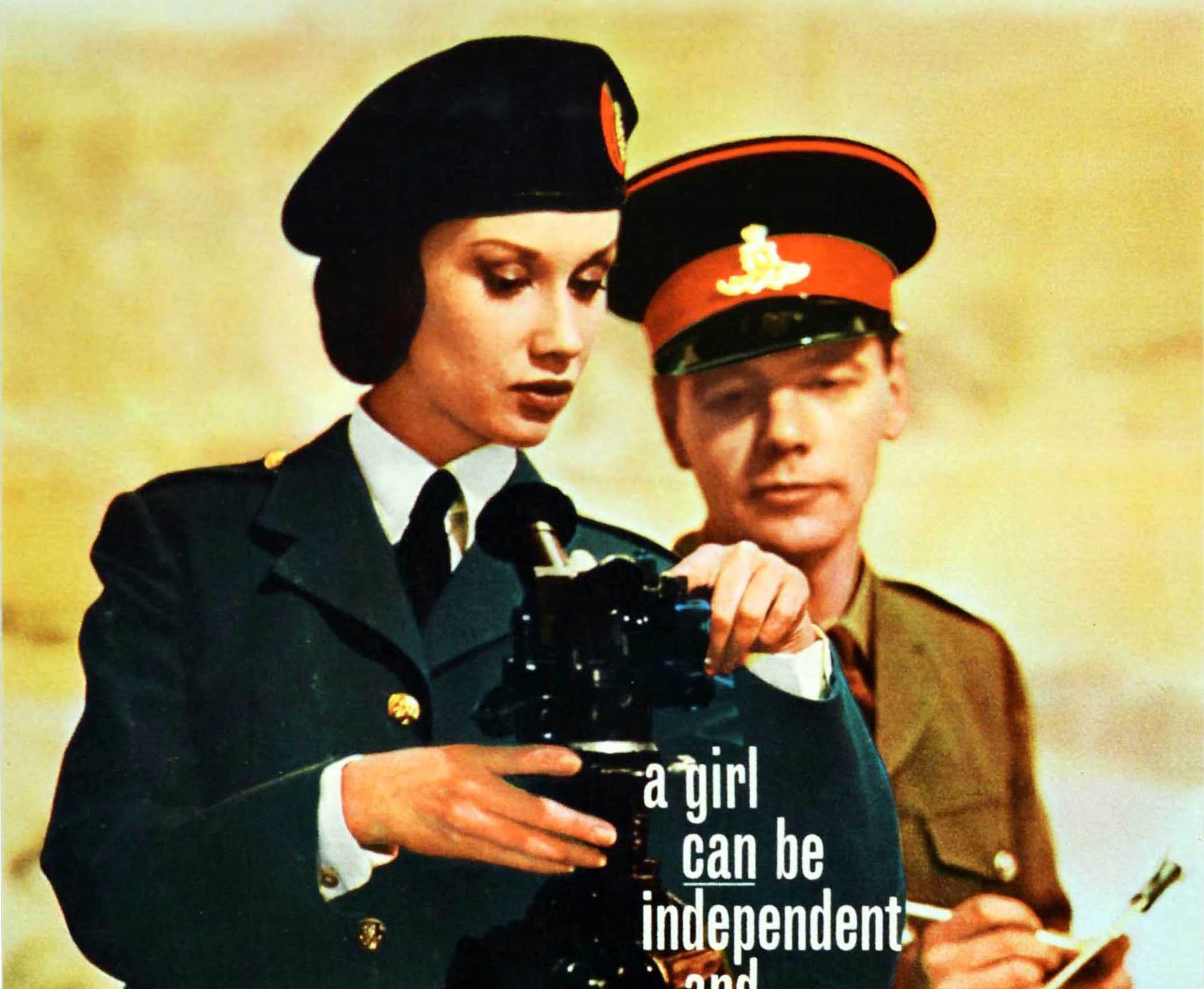 Original vintage military recruitment poster for the Women's Royal Army Corps (1949-1992): You'll Be Happy In The WRAC featuring a new recruit in smart uniform being assessed on equipment use by an army officer with a clipboard behind her, the