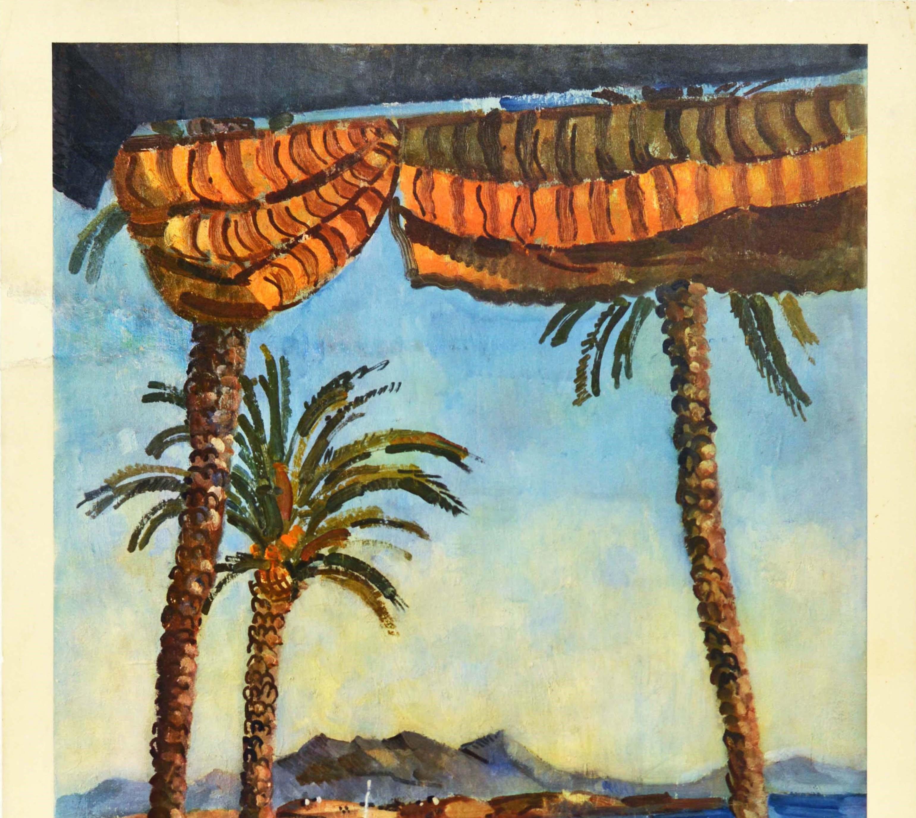 Original vintage SNCF railway travel poster for the Cote d'Azur / French Riviera on the Mediterranean coast featuring a scenic view by the French painter Edmond Ceria (1884-1955) towards hills on the horizon with sailing boats at sea and boats