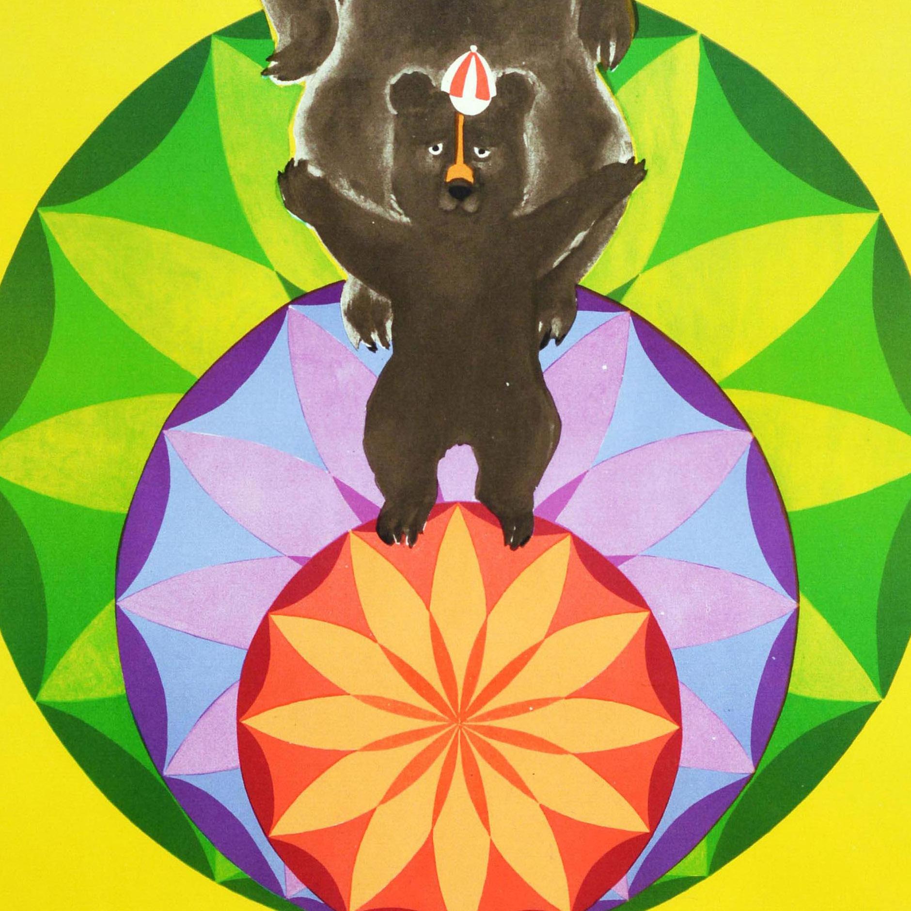 Original vintage Soviet circus poster - ?????????????? ??????? ???? / Trained Bears - featuring three bears as a family on top of three colourful balls against a bright background, the small bear at the front wearing a cap with the mother bear