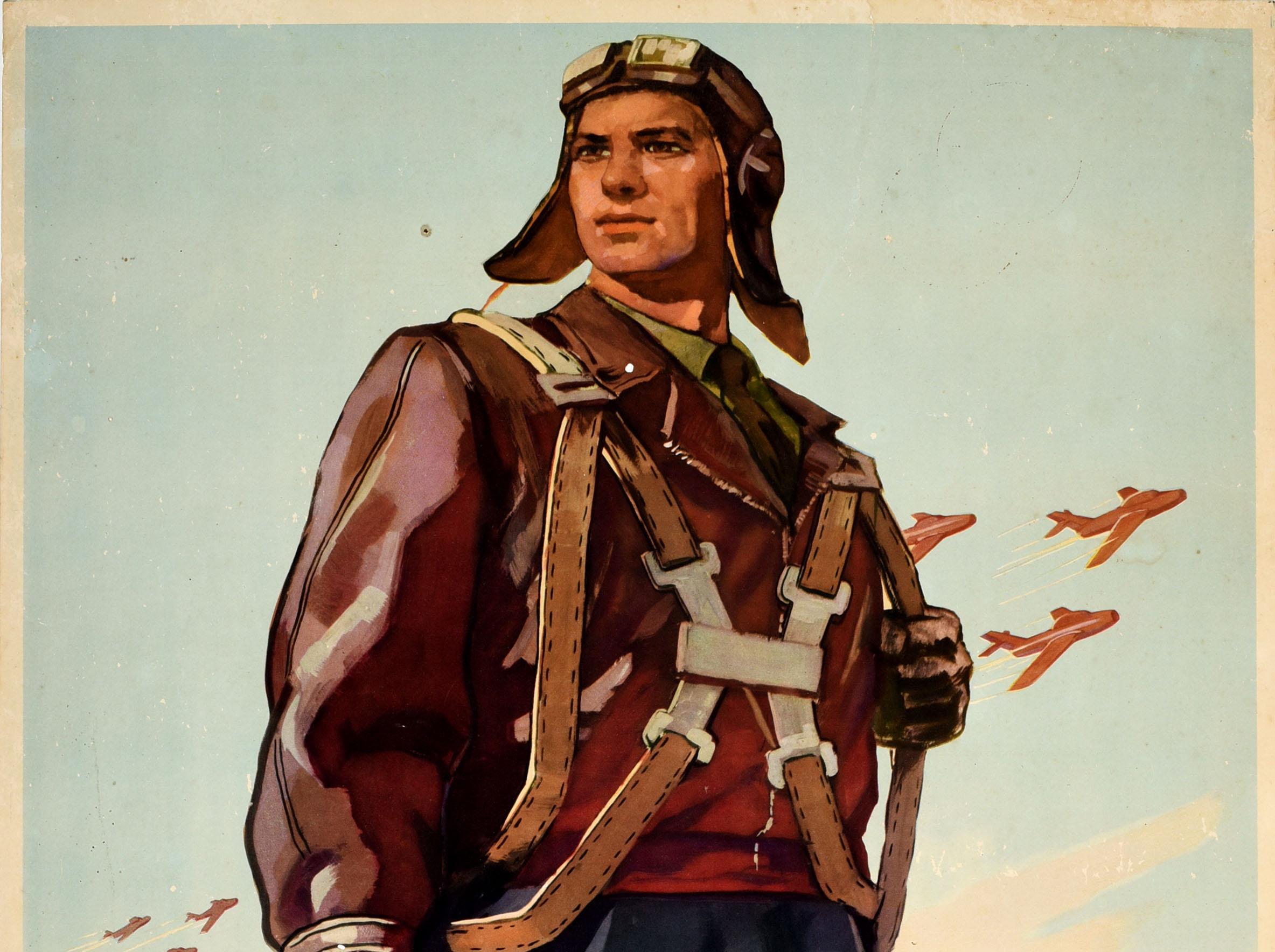 Original vintage Soviet propaganda poster - Glory to the Winged Heroes! / ????? ???????? ?????????! Dynamic artwork by Igor Aleksandrovich Kominarets (b 1923) depicting a pilot in uniform standing in front of fighter jets and other planes flying