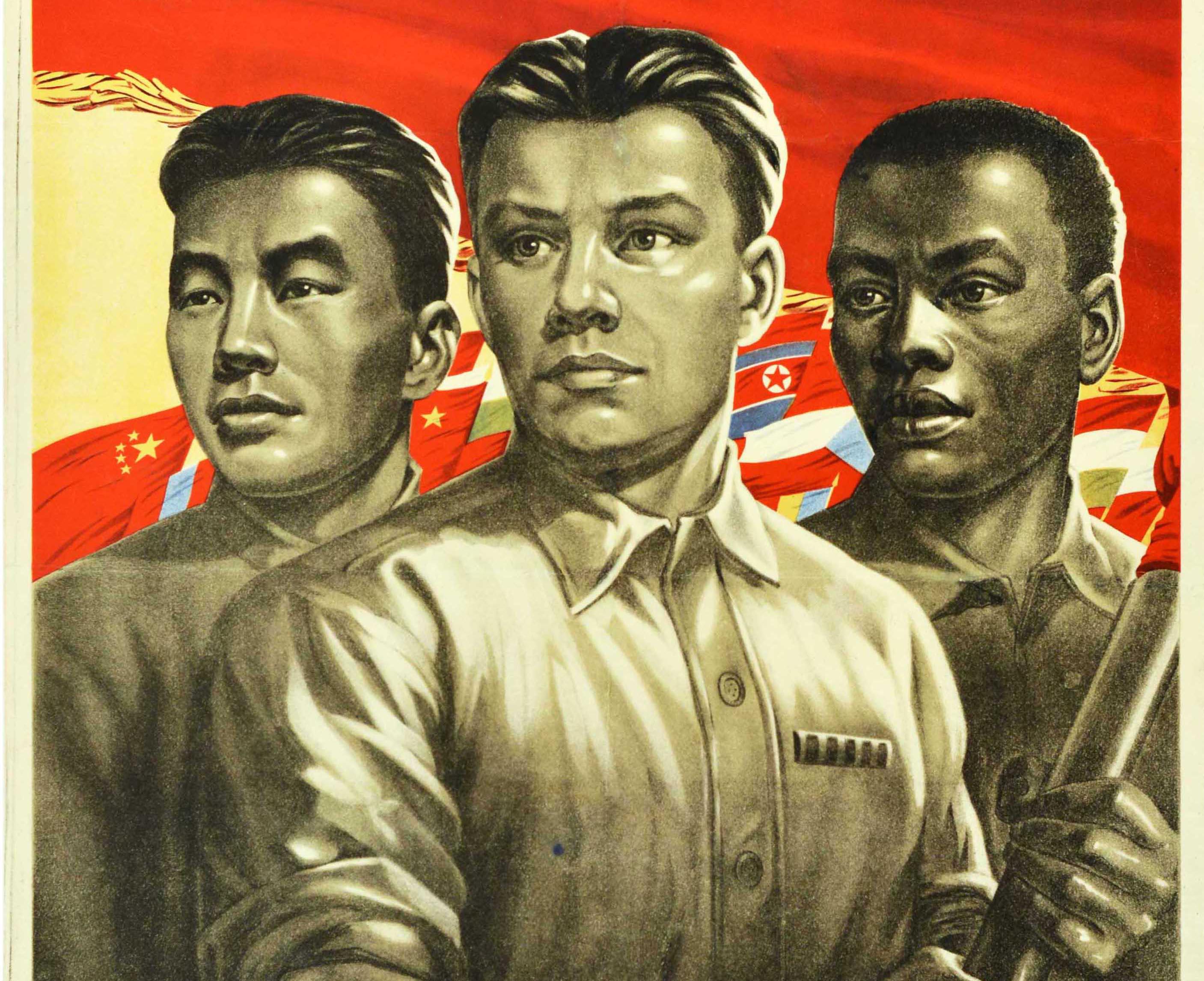 Original vintage propaganda poster - We Will Stand for Peace - featuring a dynamic design of three young men representing different nations of the world holding up a red banner with a gold fringe and tassels hanging down, colourful flags in the