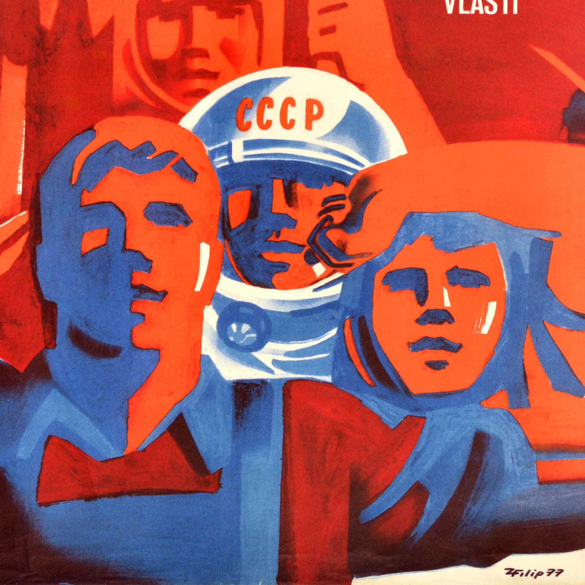 Original vintage Soviet propaganda poster commemorating the anniversary of the October Revolution featuring an illustration of a worker in overalls holding a red banner and a hammer and sickle, a cosmonaut in a space helmet marked CCCP / USSR and a