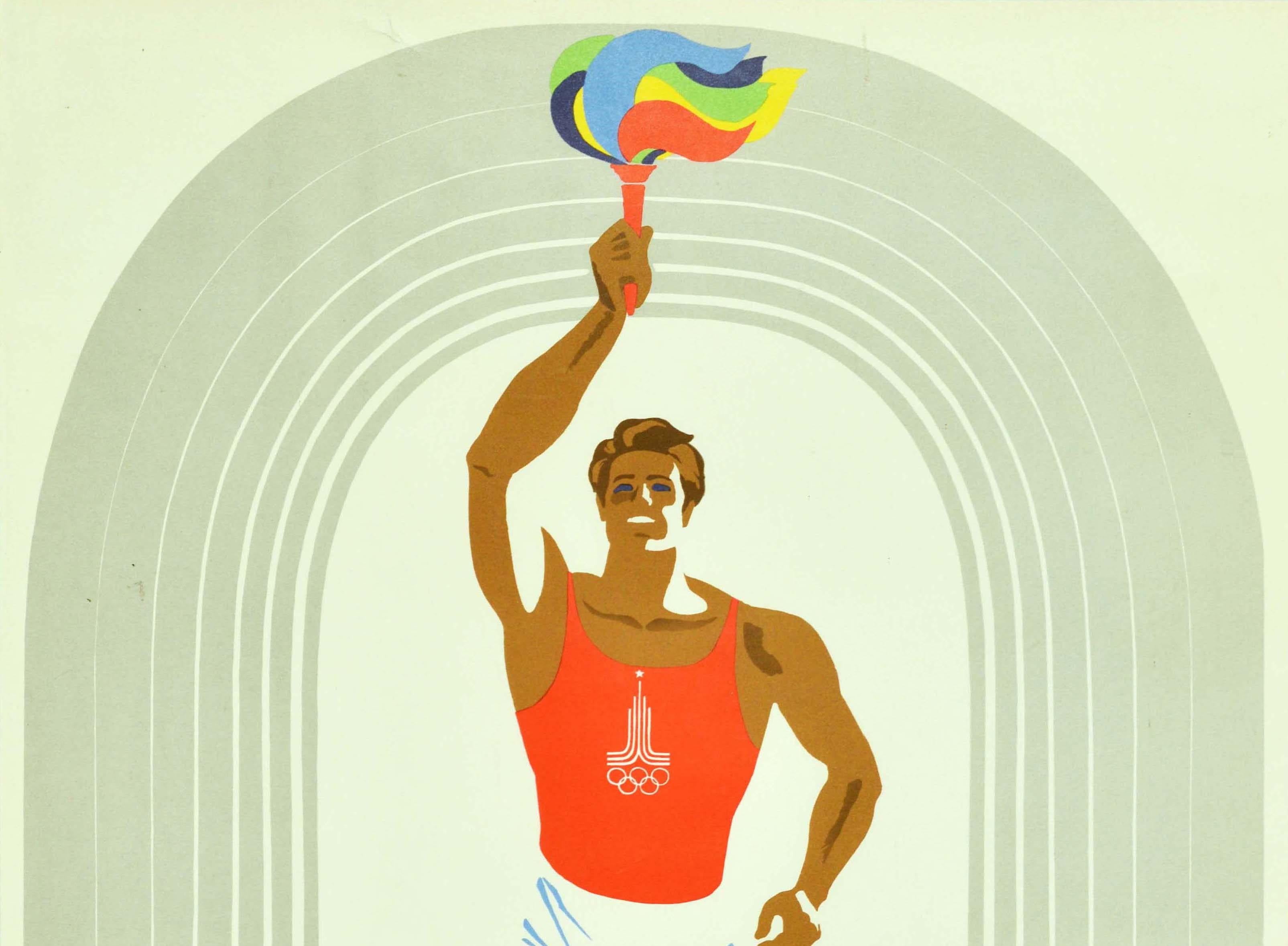 Original vintage sport poster for the 1980 Olympic Games in Moscow Russia featuring an athlete in a red sports top with the Moscow Olympics logo on it, running towards the viewer whilst holding the Olympic torch with the flame in the Olympic