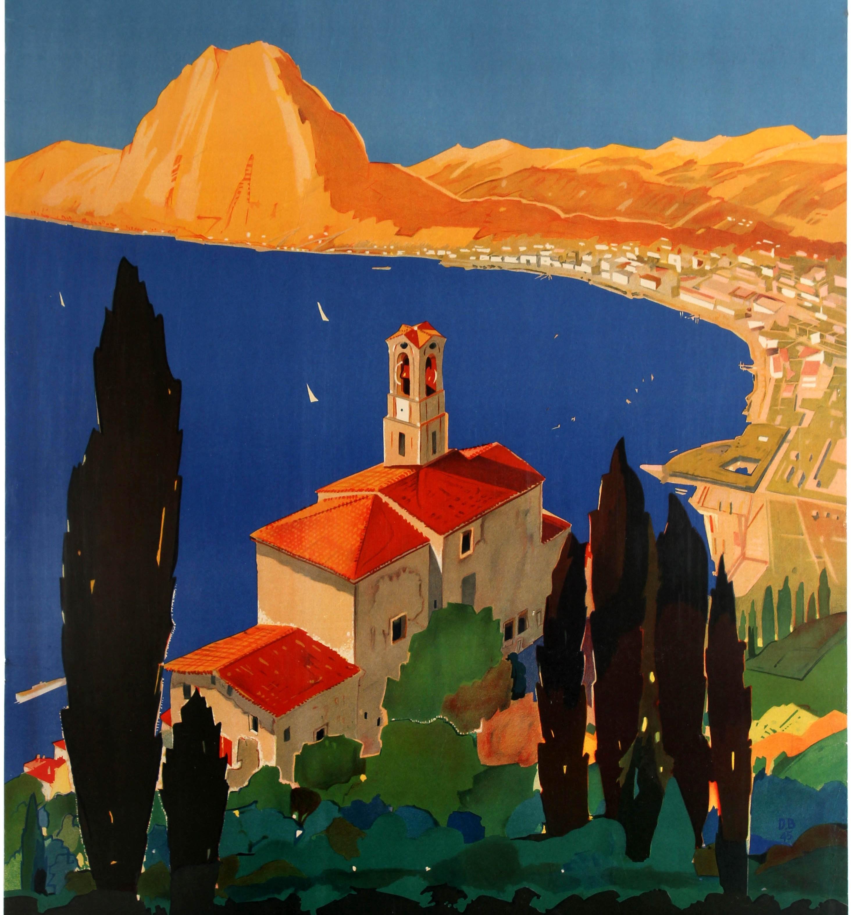Original vintage travel poster promoting the city of Lugano located on Lake Lugano near the border with Italy in southern Switzerland. Fantastic artwork by Daniele Buzzi (1890-1974) featuring a scenic view of the lake with cypress trees and a church