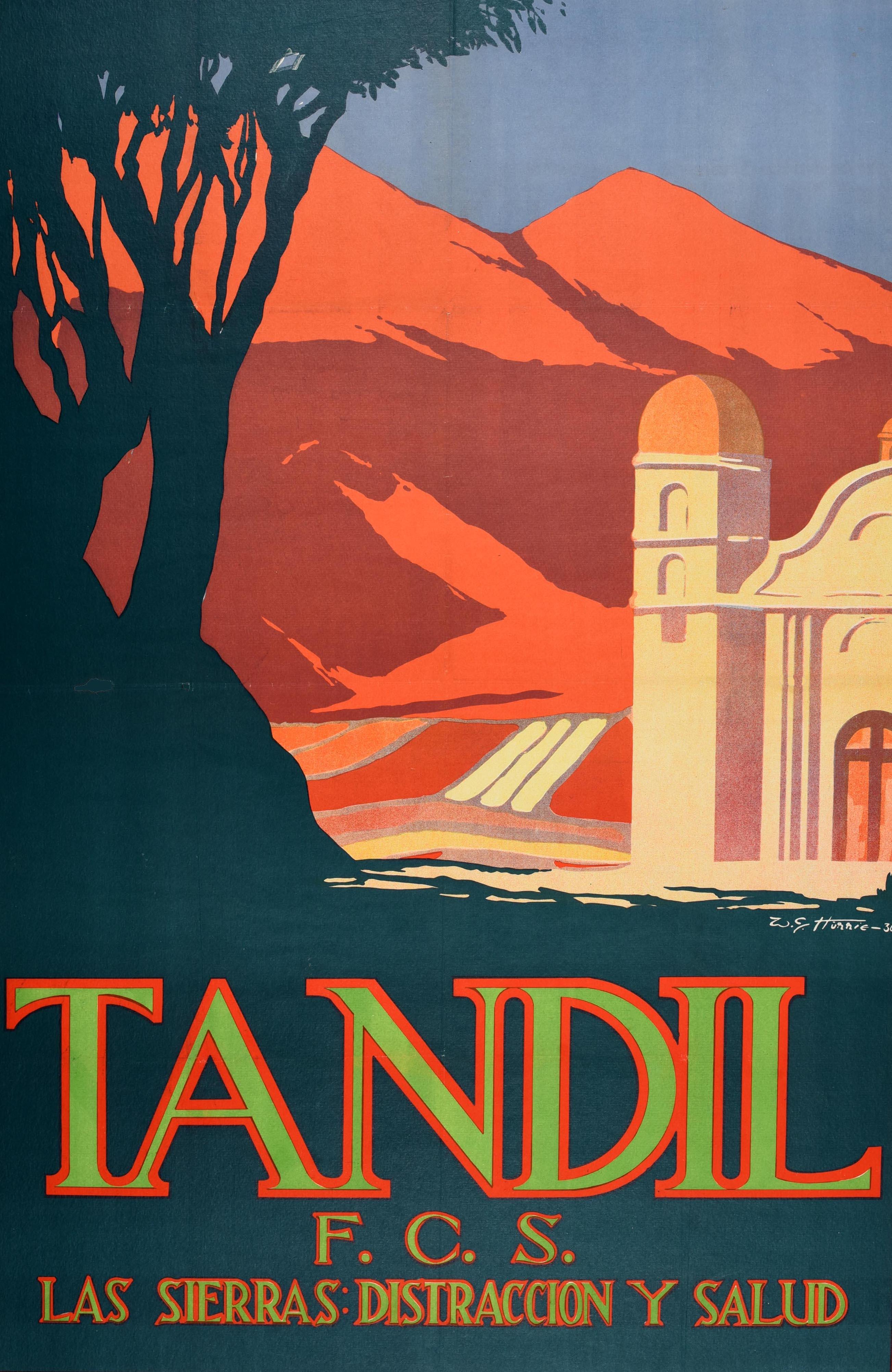 Original vintage train travel poster for Tandil F.C.S. Las Sierras Distraccion y Salud / The Mountains Relaxation and Health featuring a scenic Art Deco view of the edge of a building in front of hills glowing red with shadows in the light below the