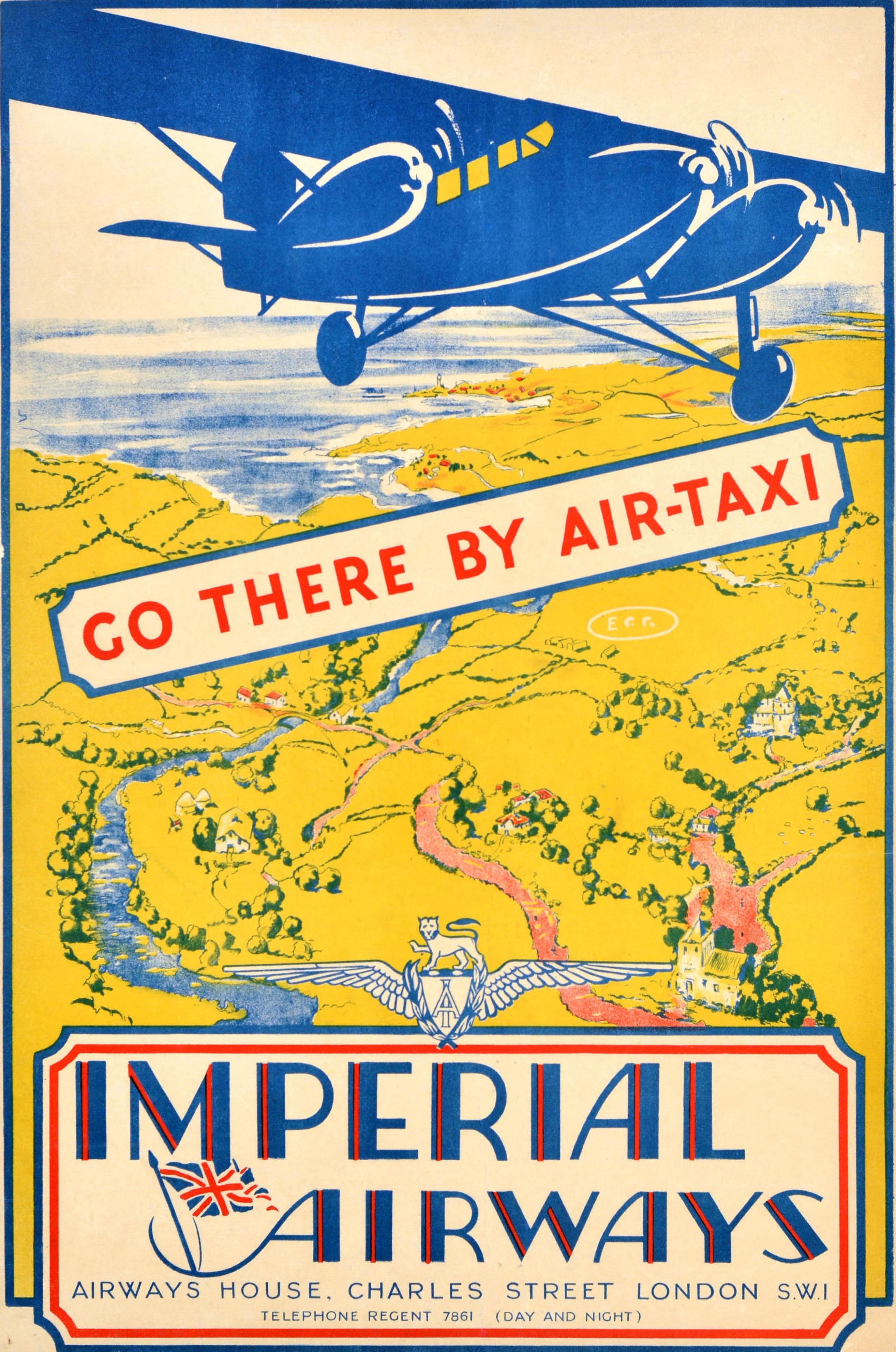 Affiche publicitaire originale de voyage pour Imperial Airways Go There By Air-Taxi comportant une grande illustration d'un avion à hélice bleu survolant une rivière coulant entre des champs et des bâtiments dans la campagne en contrebas, la mer le