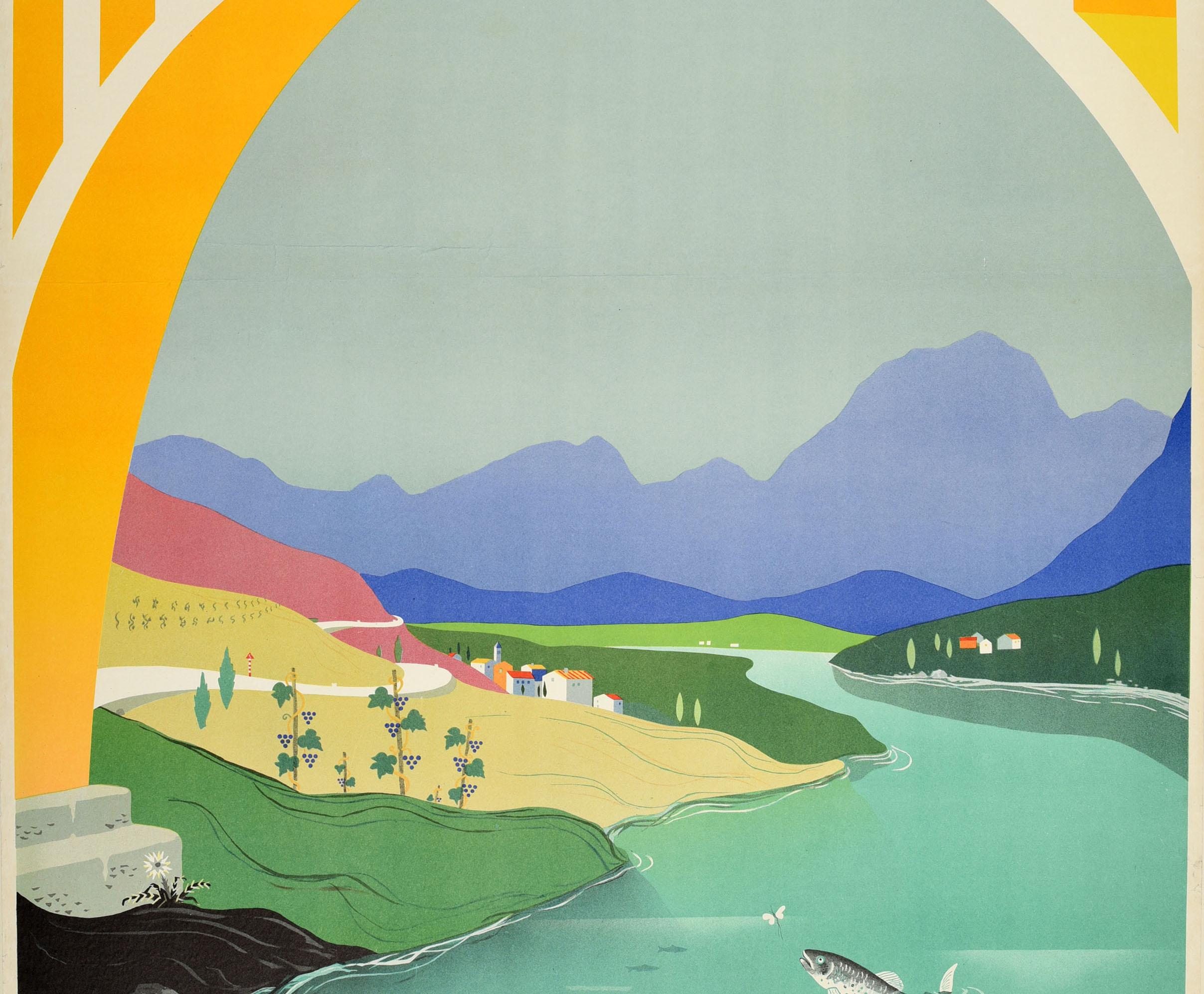 Original vintage travel advertising poster published by the Slovenian Tourism Association to promote the region of Slovenia in (the former) Yugoslavia - Slovenija Yugoslavija. Scenic river view featuring a tall railway bridge arch with a train