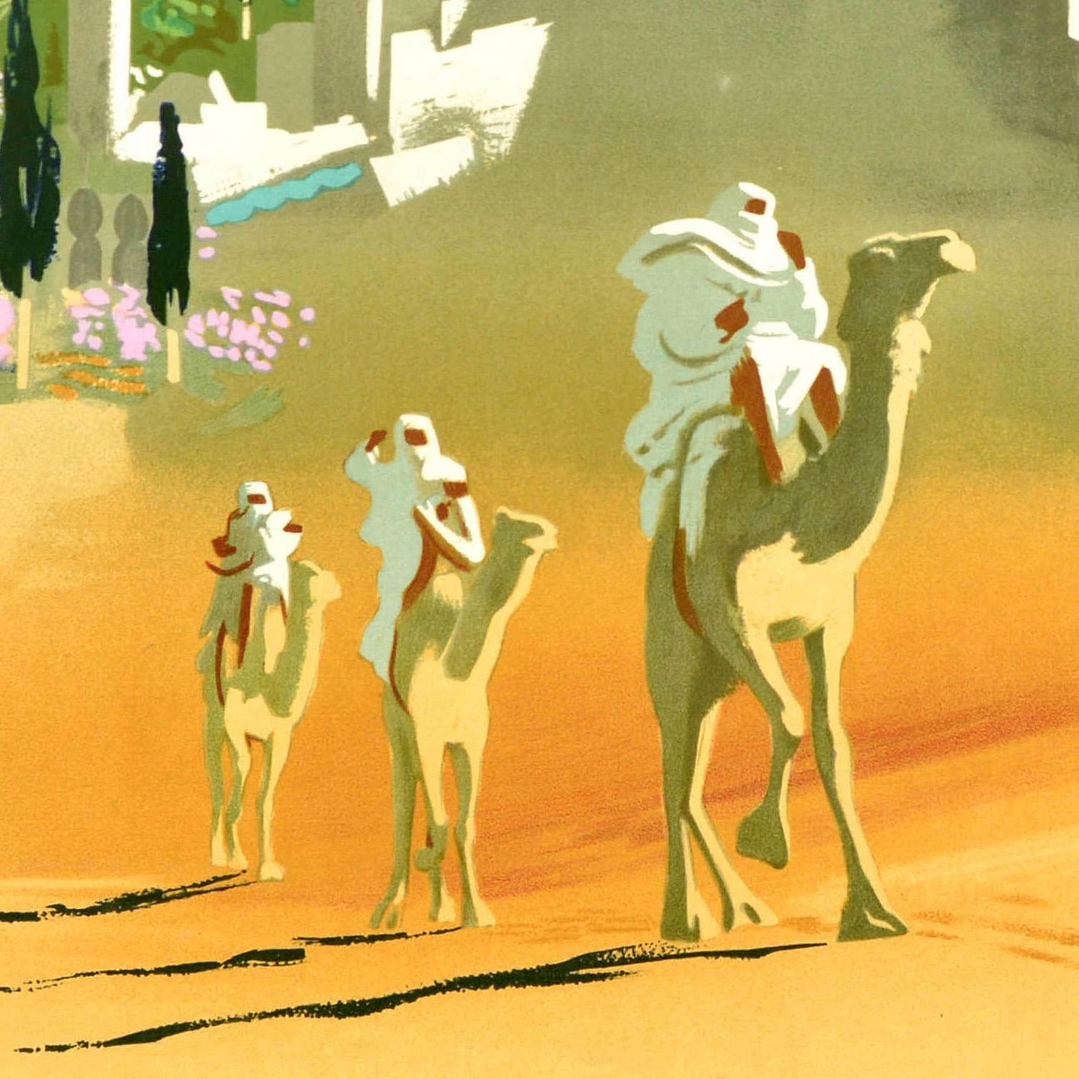 Original vintage travel poster for the Middle East / Proche Orient Air France (Near East) featuring a colourful illustration by the French artist Jean Even (1910-1986) depicting people in white clothing riding camels up a hill in the desert sand
