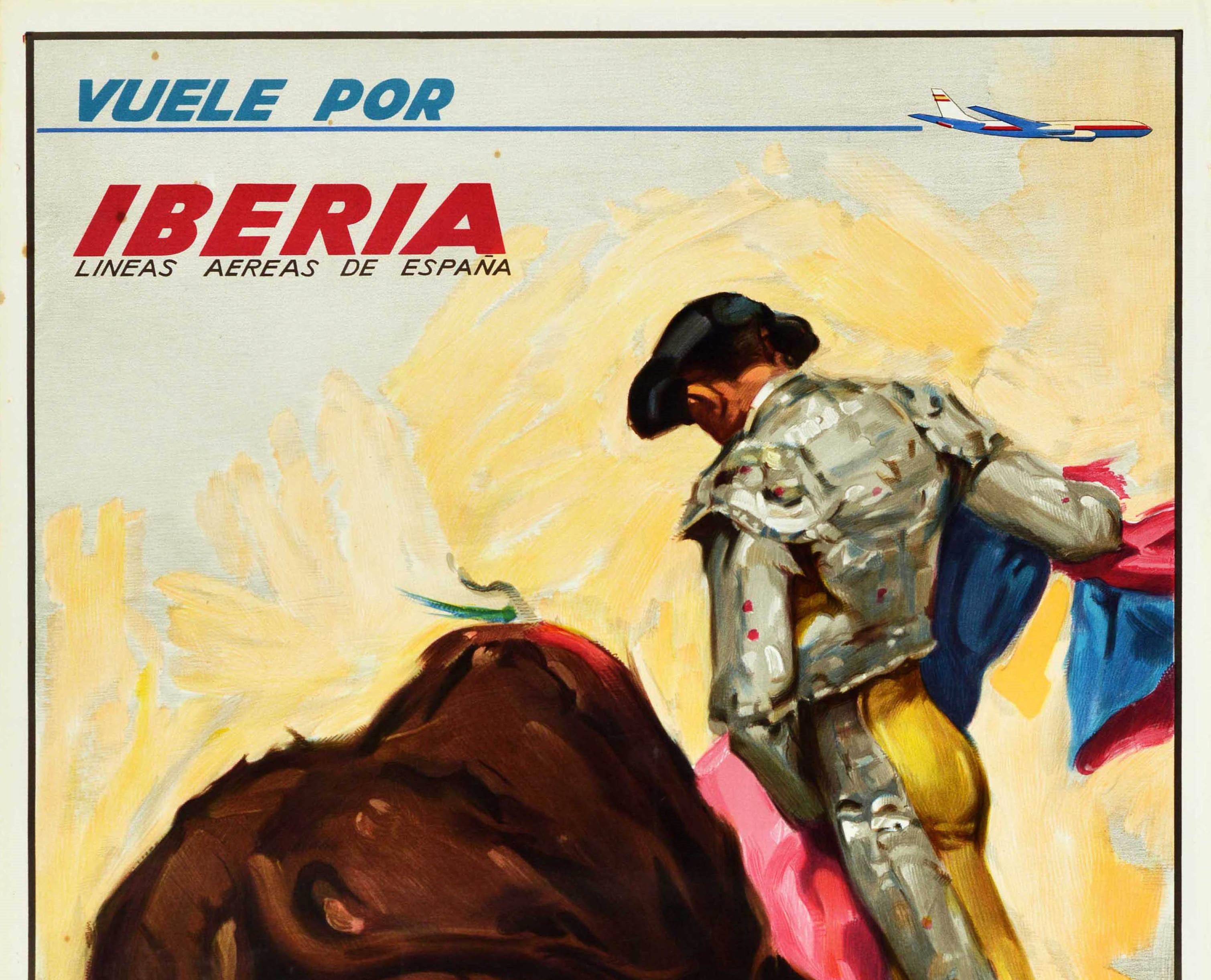 Original vintage travel poster - Vuele por Iberia Lineas Aereas de Espana / Fly with Iberia Airlines of Spain - featuring a colourful image of a bullfight with the torero / bullfighter wearing a traditional uniform and holding a colourful cape as a