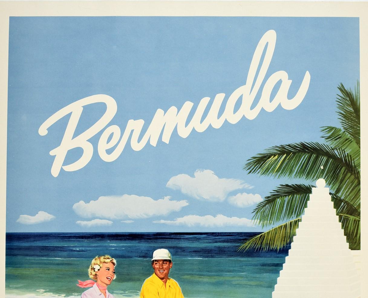 Original vintage travel poster for Bermuda featuring a great illustration of a smartly dressed man and lady wearing Bermuda shorts and smiling at each other as they ride their bikes along a seaside road behind pink flowers with people sunbathing